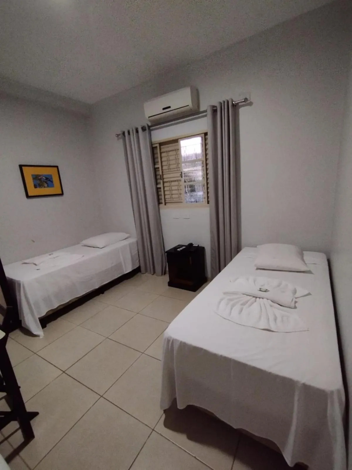 Bed in Hotel Pousada Calliandra