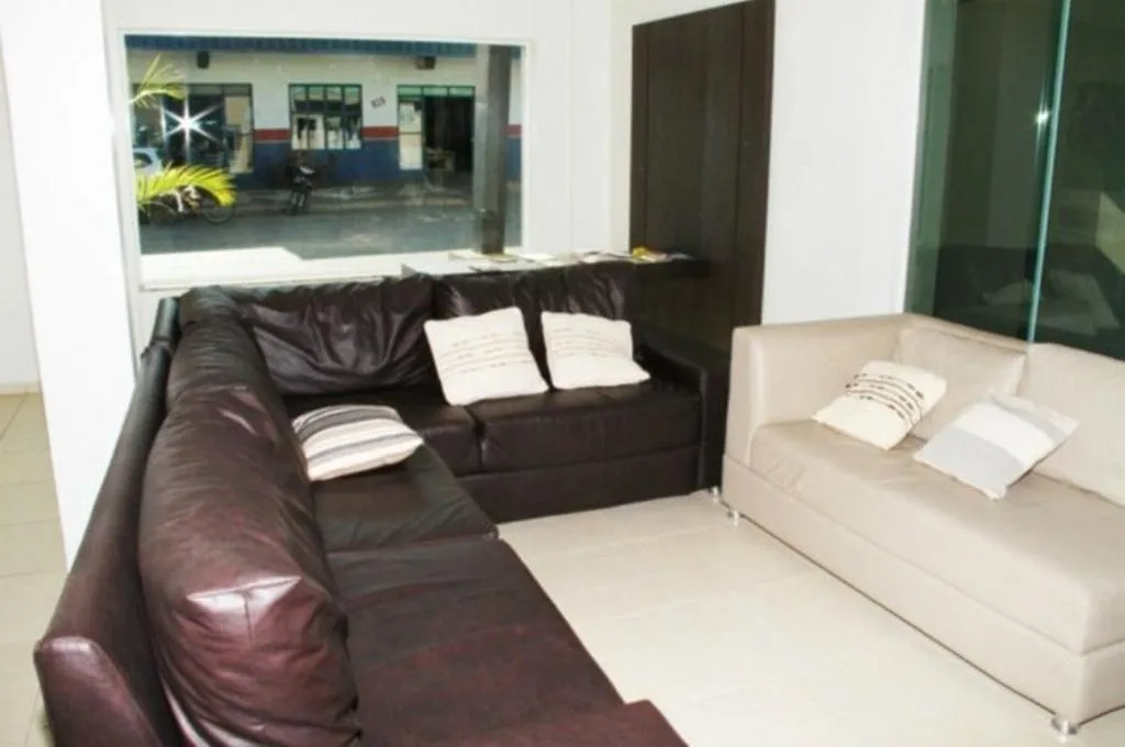 Communal lounge/ TV room in Hotel Pousada Calliandra