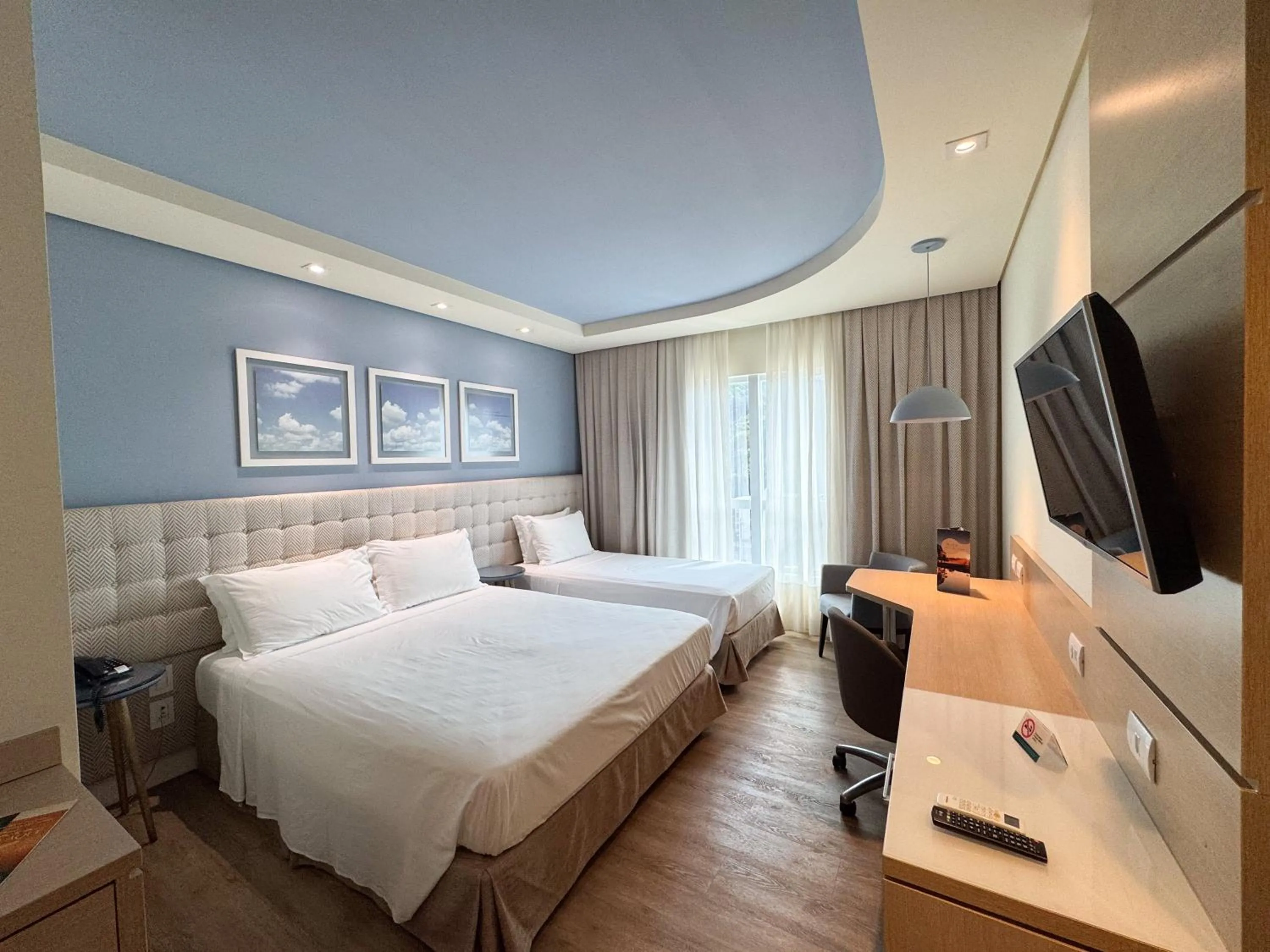 Bed in Kayrós Business Hotel