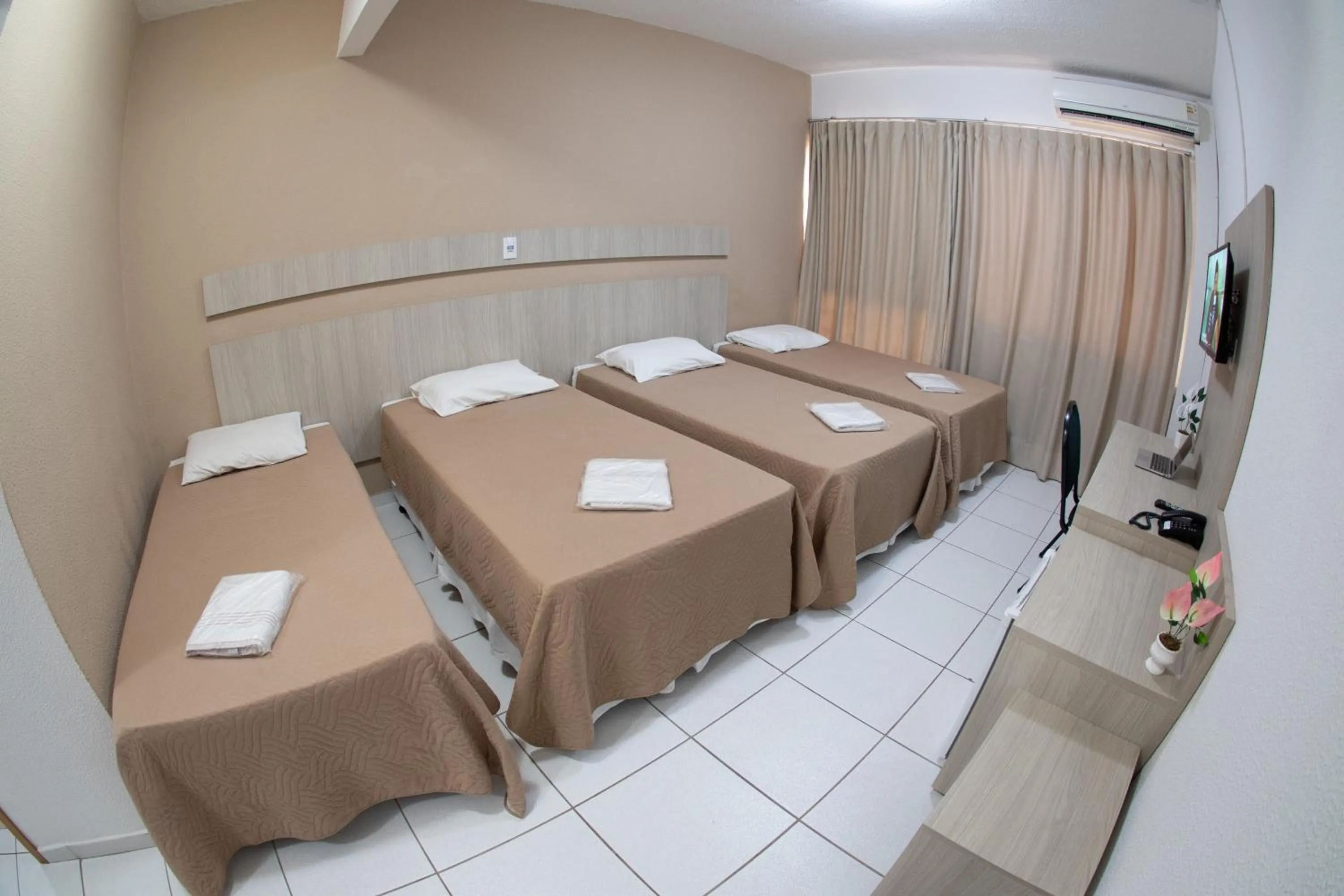 Bed in Getúllio Hotel