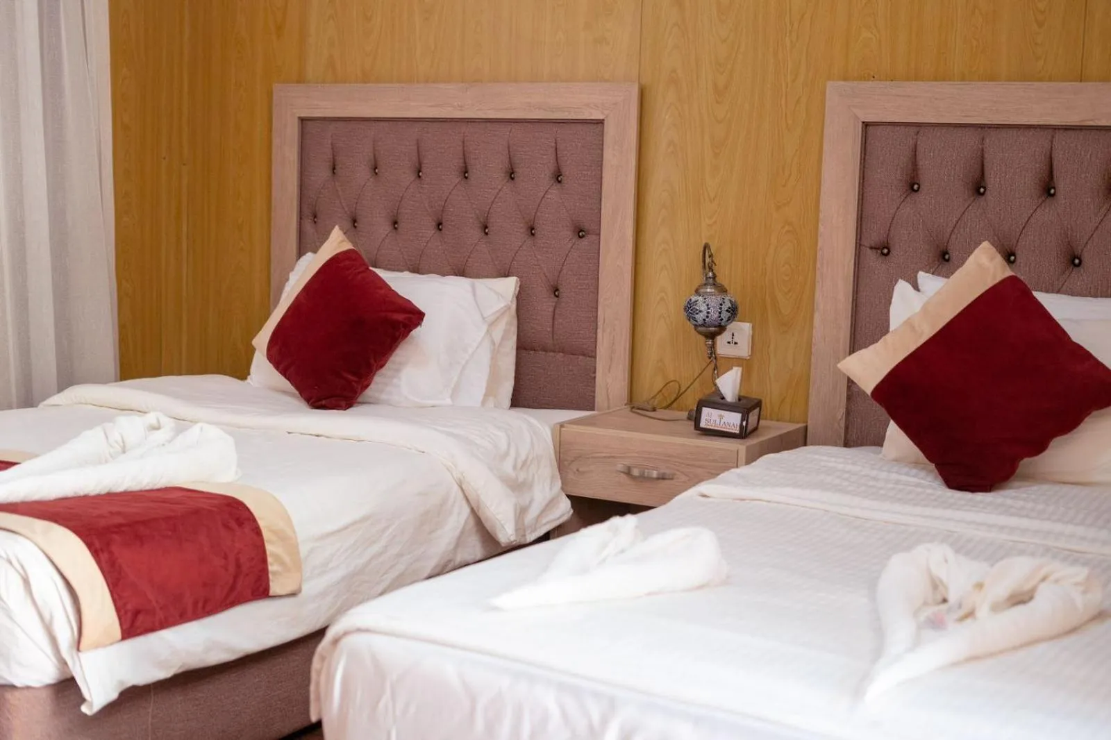 Bed in Al Sultana Luxury Camp