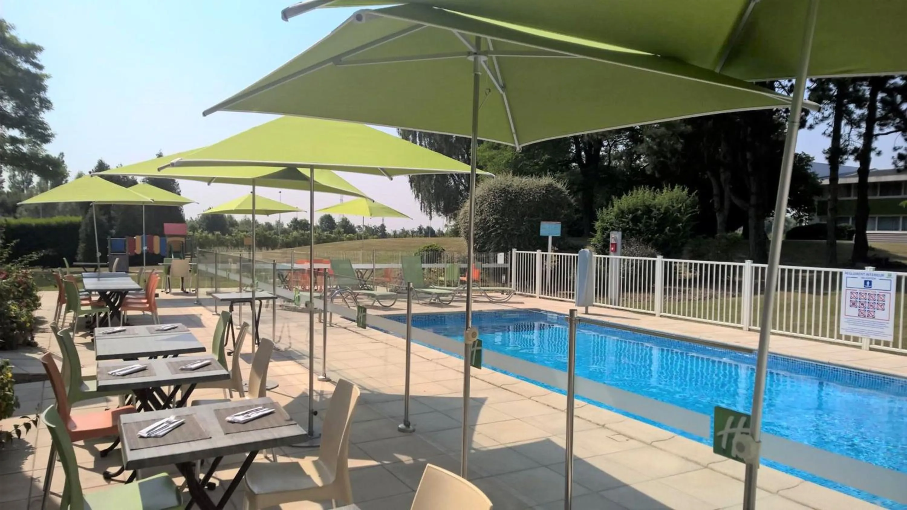Swimming pool in Holiday Inn Lille Ouest Englos by IHG