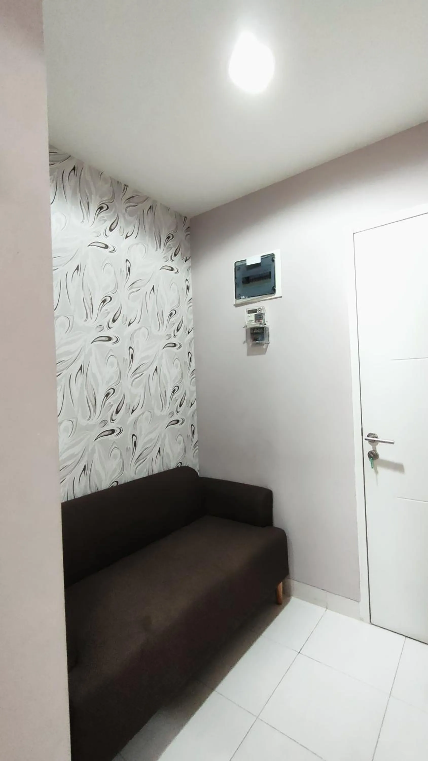 Seating area in Kozy Room Sentul Tower Apartemen