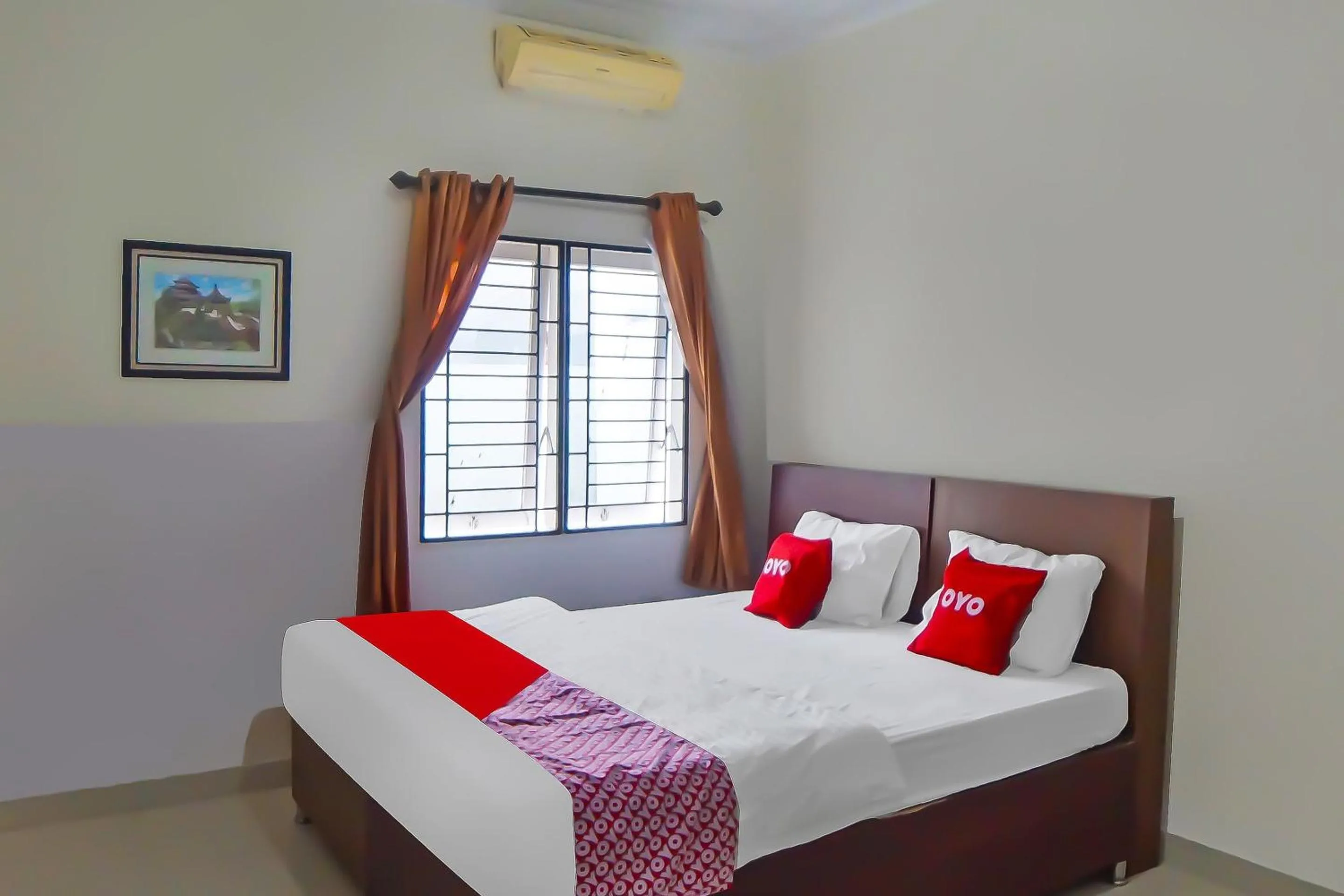 Bedroom, Bed in OYO 92314 De Coco Guesthouse