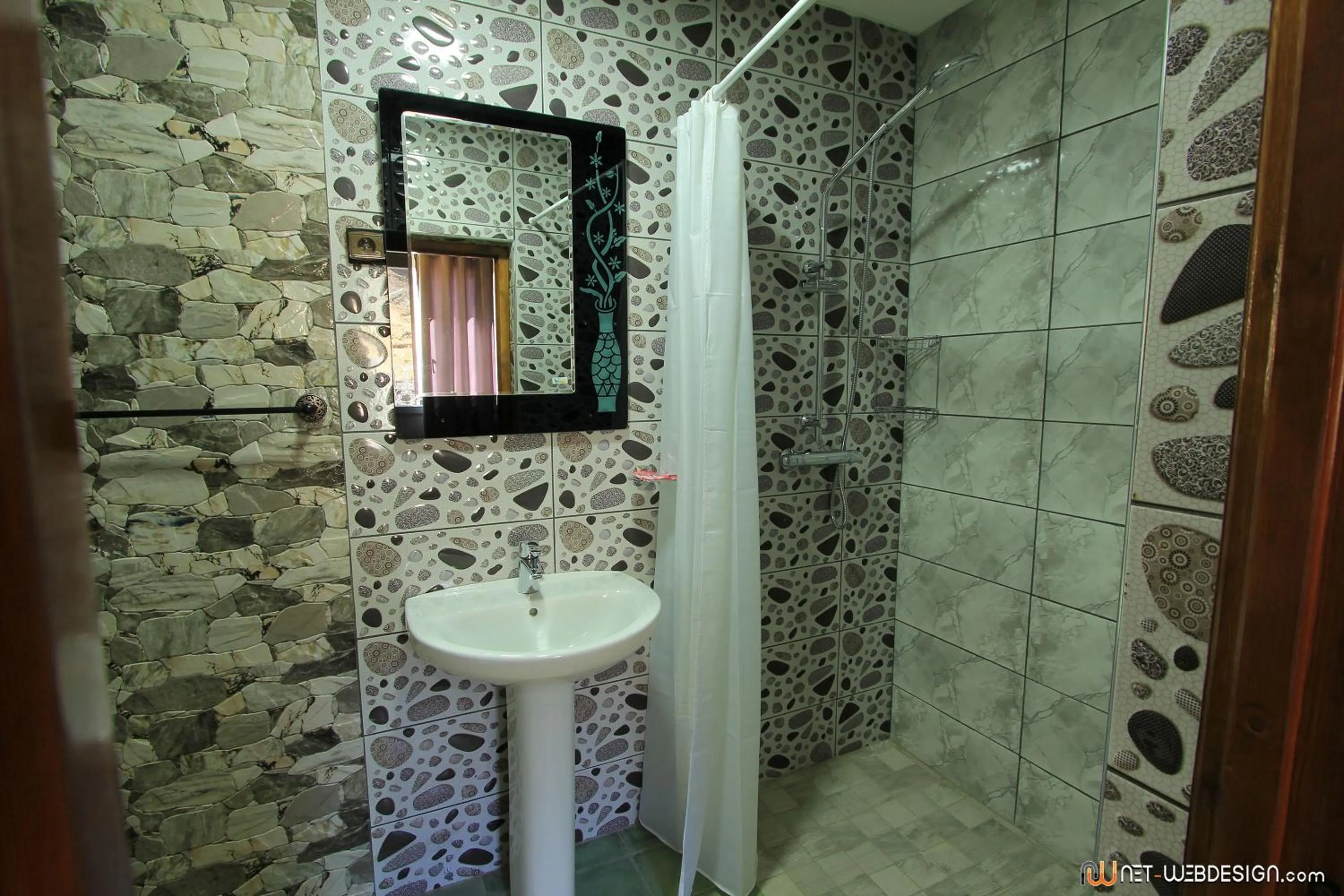 Bathroom in Hotel New Mars Dades