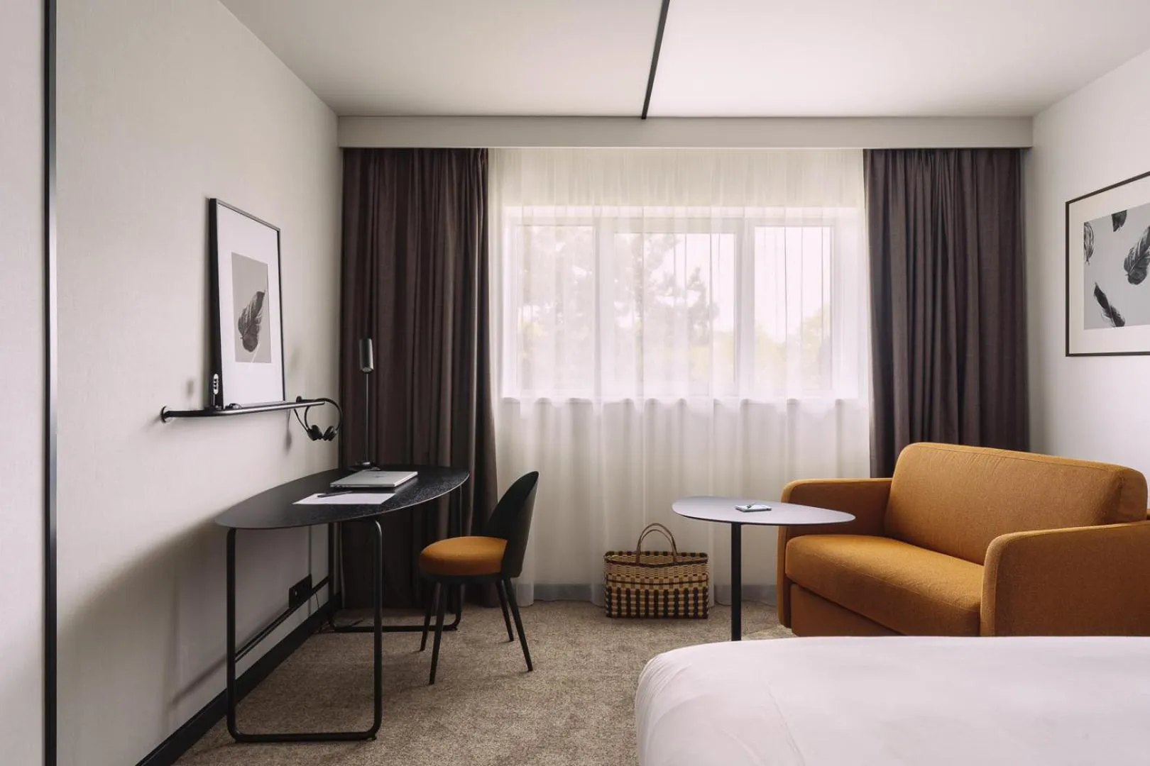 Photo of the whole room in Novotel Saint-Quentin en Yvelines