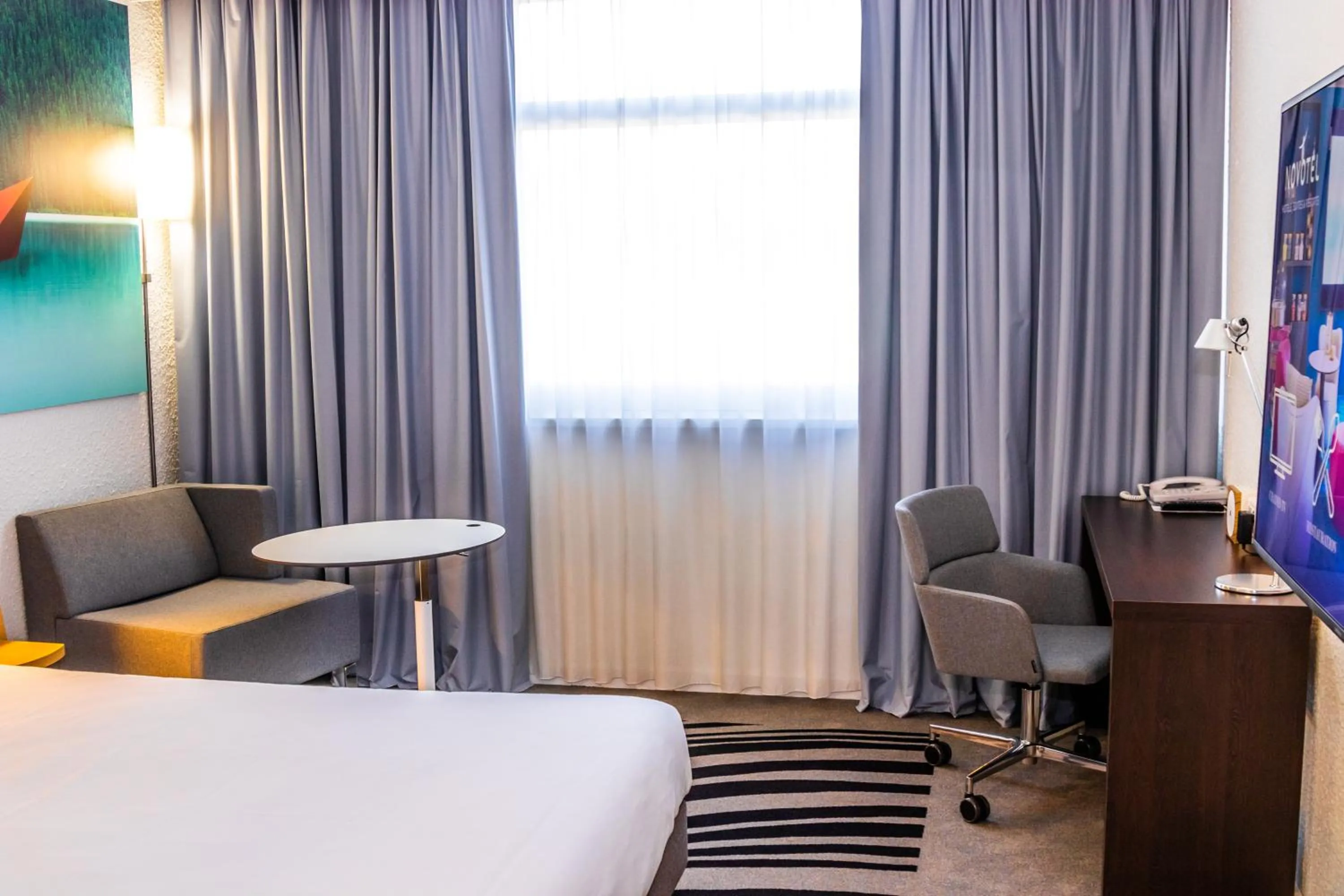 Bed in Novotel Lyon Bron Meeting & Events