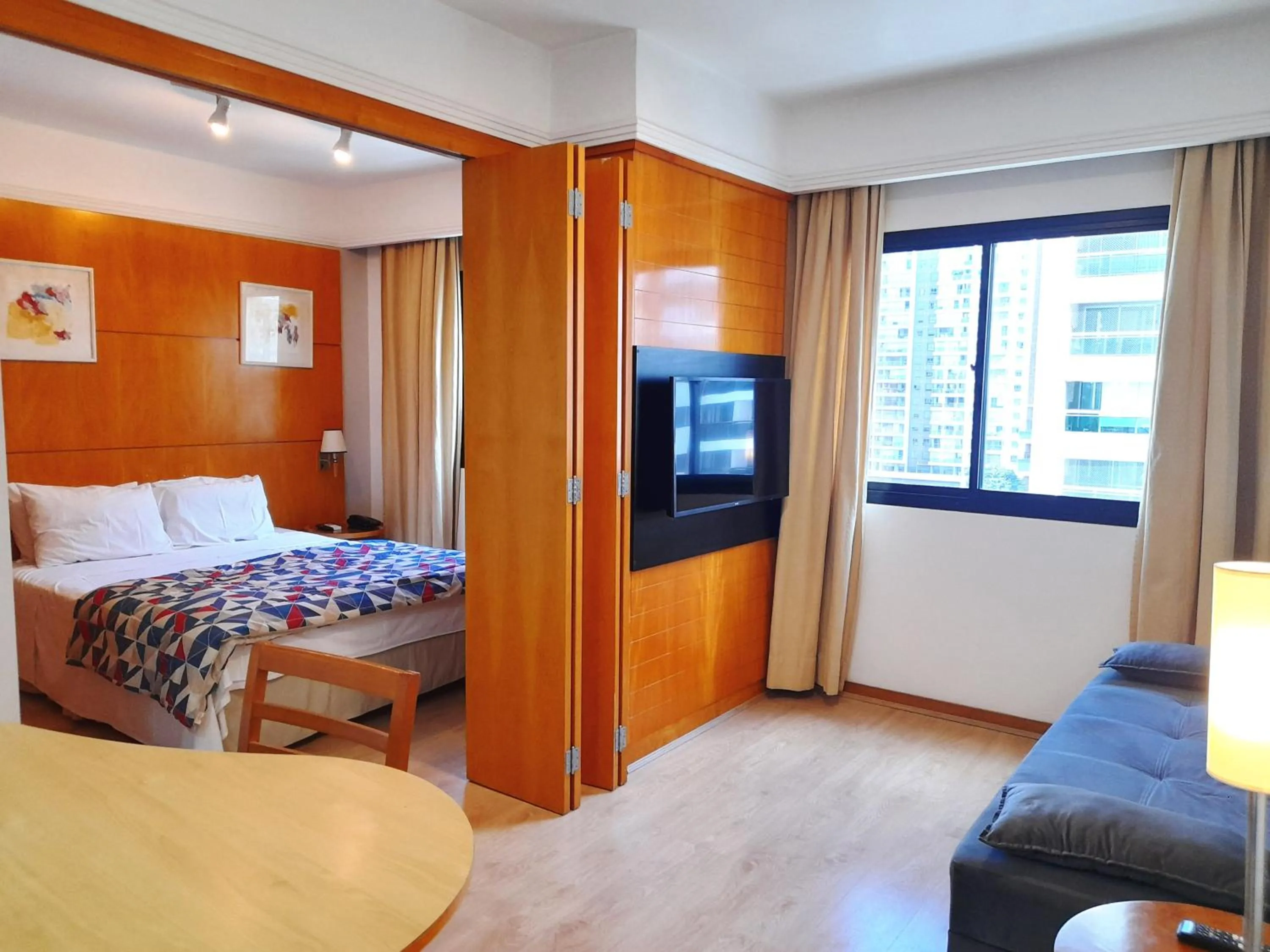 TV and multimedia, Bed in lMPECAVEL Flat - Moema proximo Shopping Ibirapuera