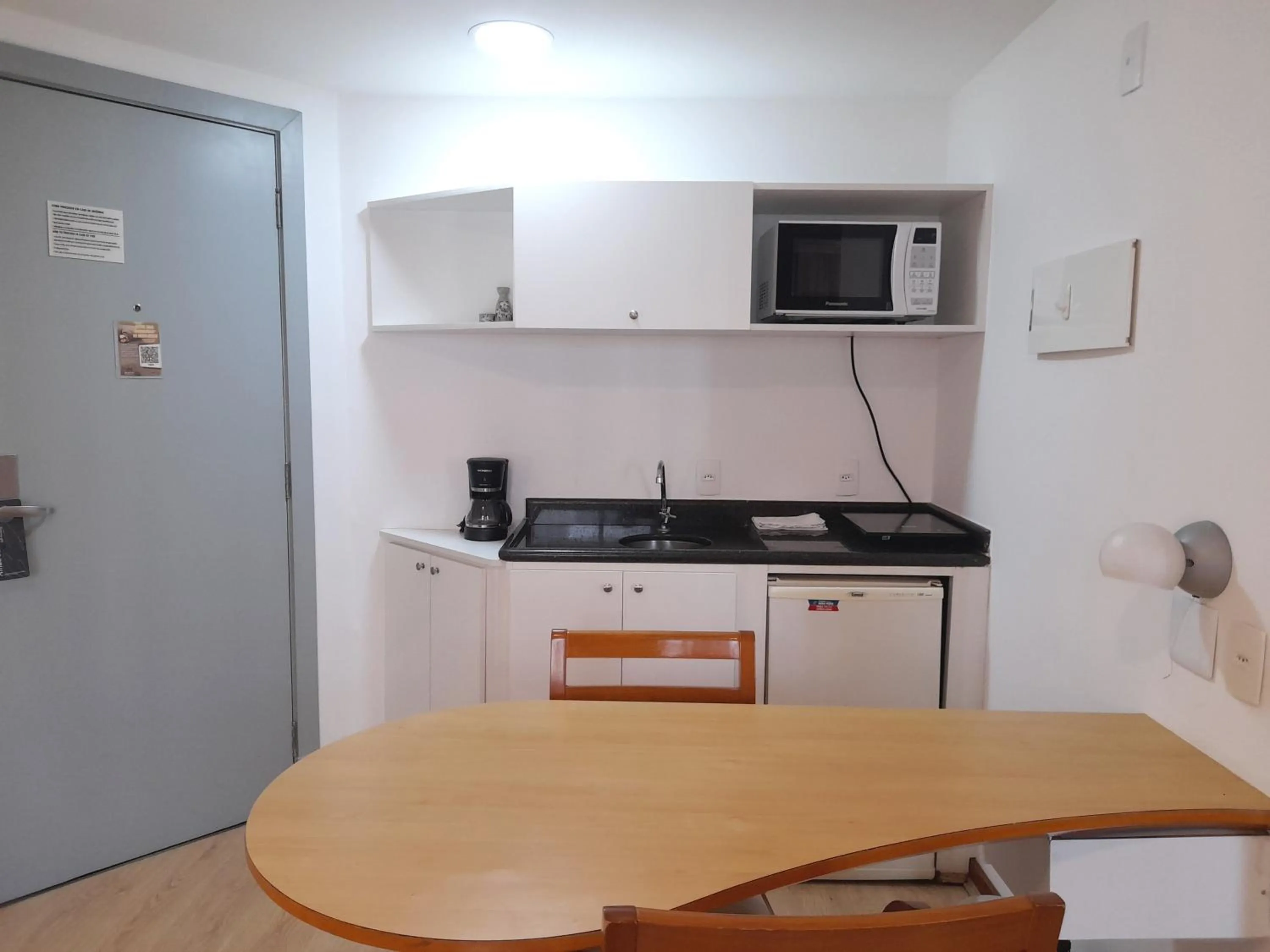 Kitchen or kitchenette in lMPECAVEL Flat - Moema proximo Shopping Ibirapuera