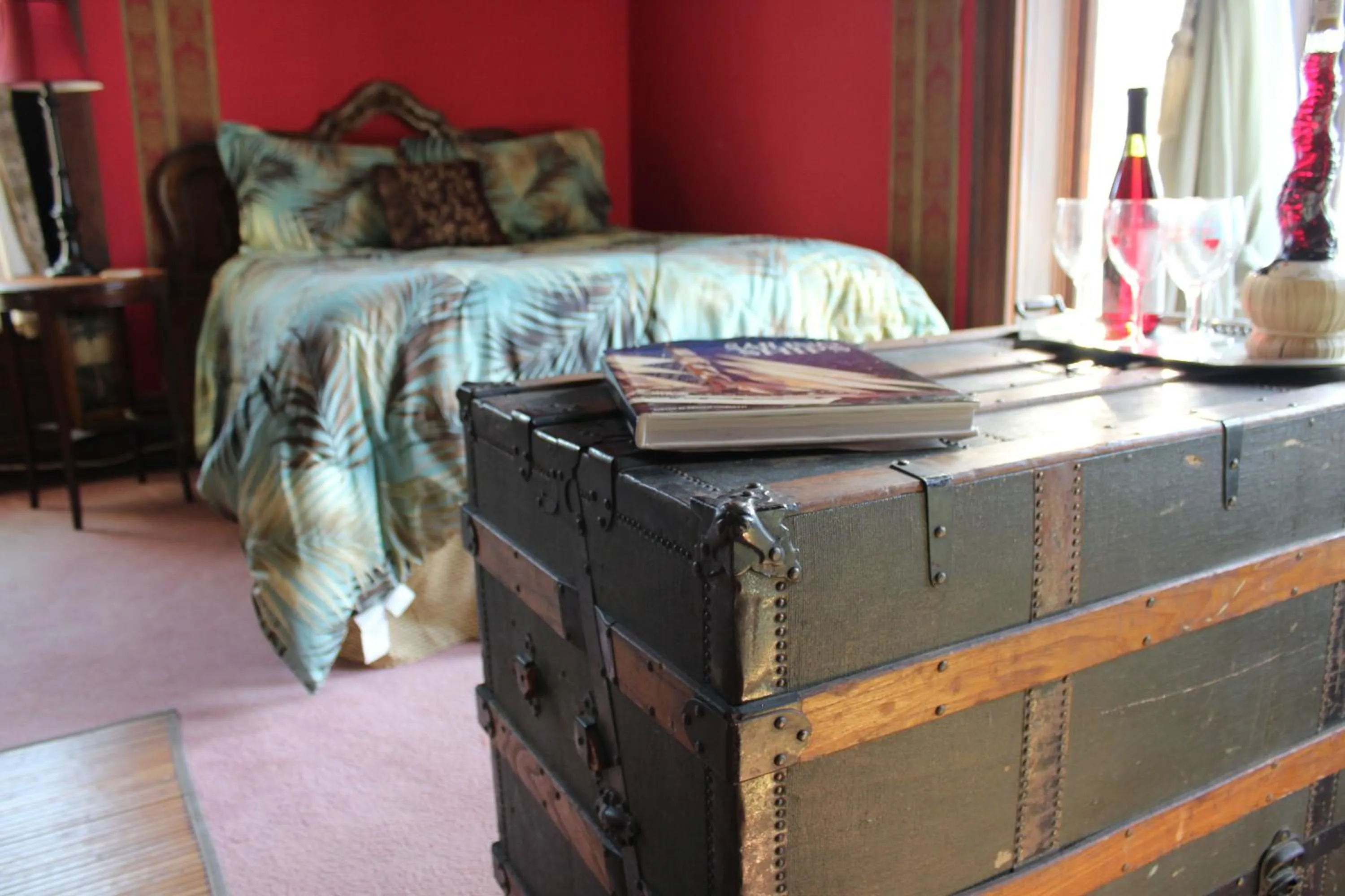 Bed in Riverview Mansion Hotel