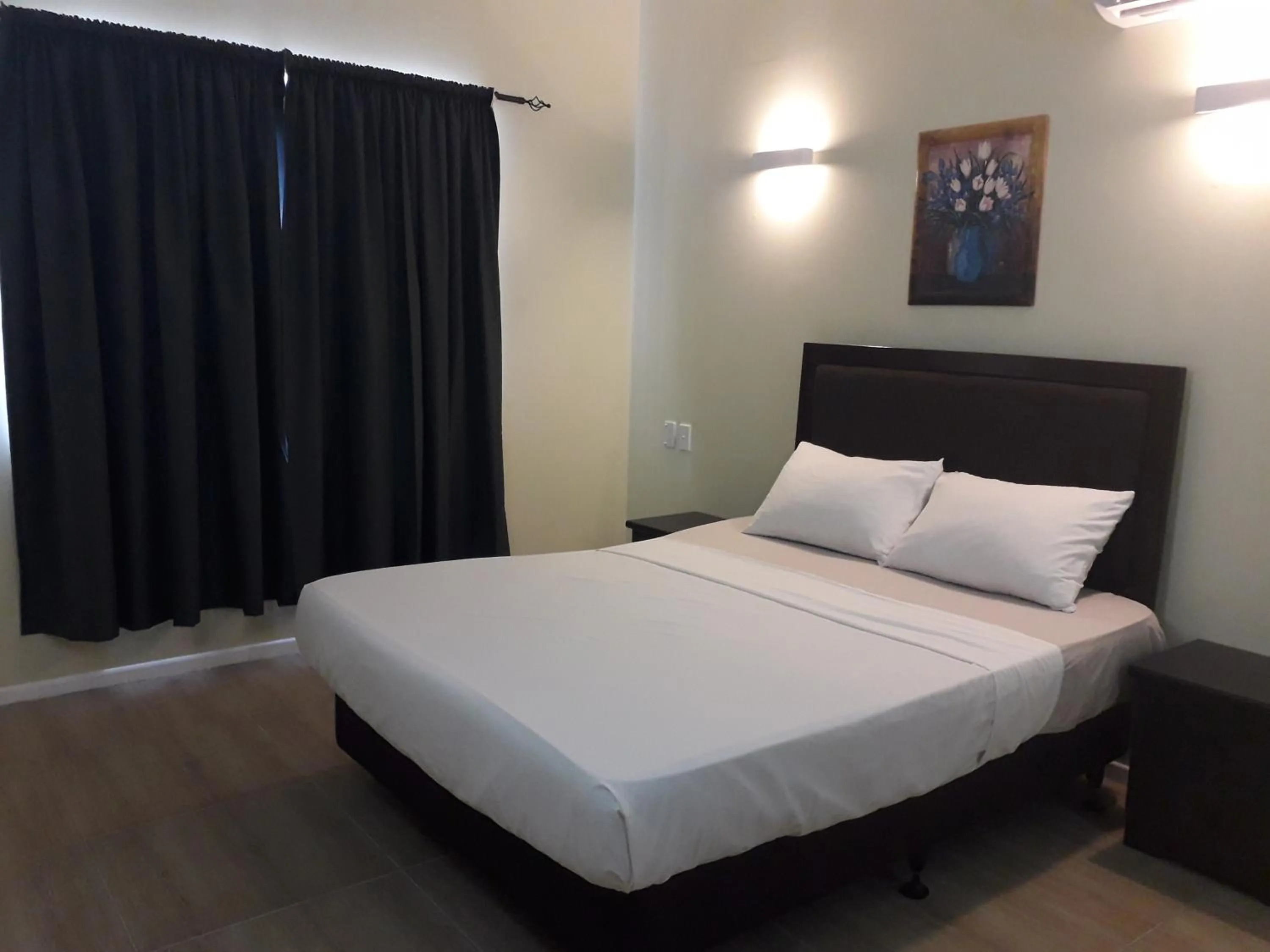 Bed in Le Uaina Beach Resort