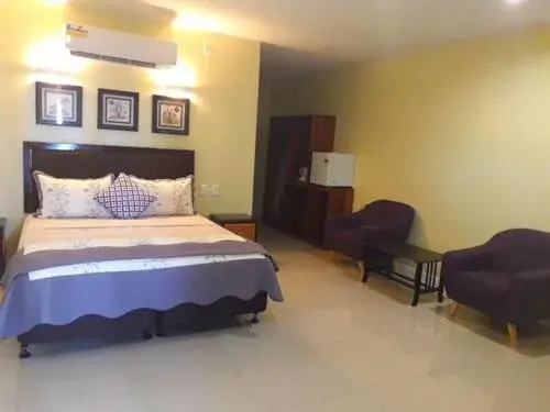 Bed in Le Uaina Beach Resort Bed in Le Uaina Beach Resort