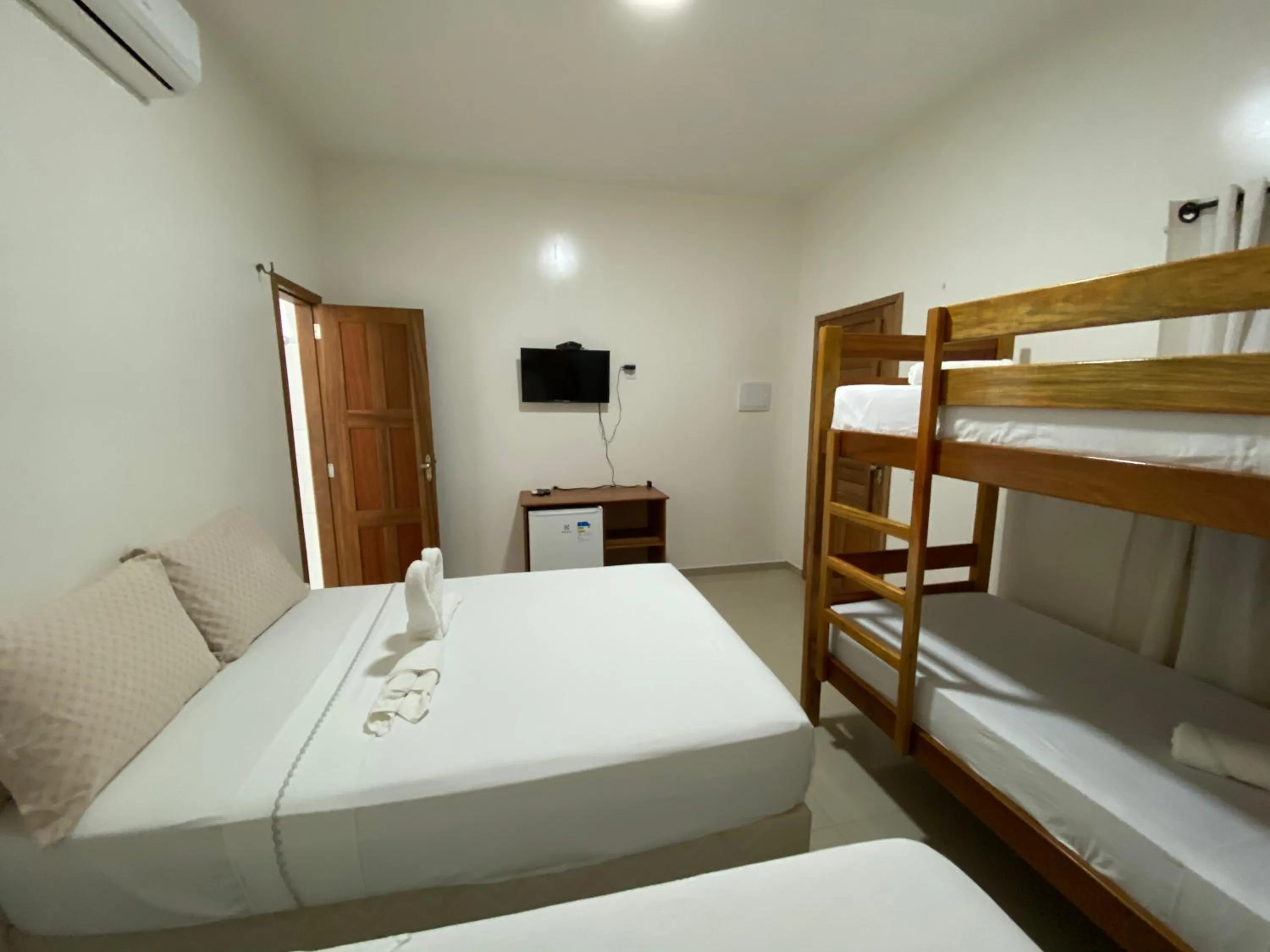 Bed in Pousada Casa da Cion