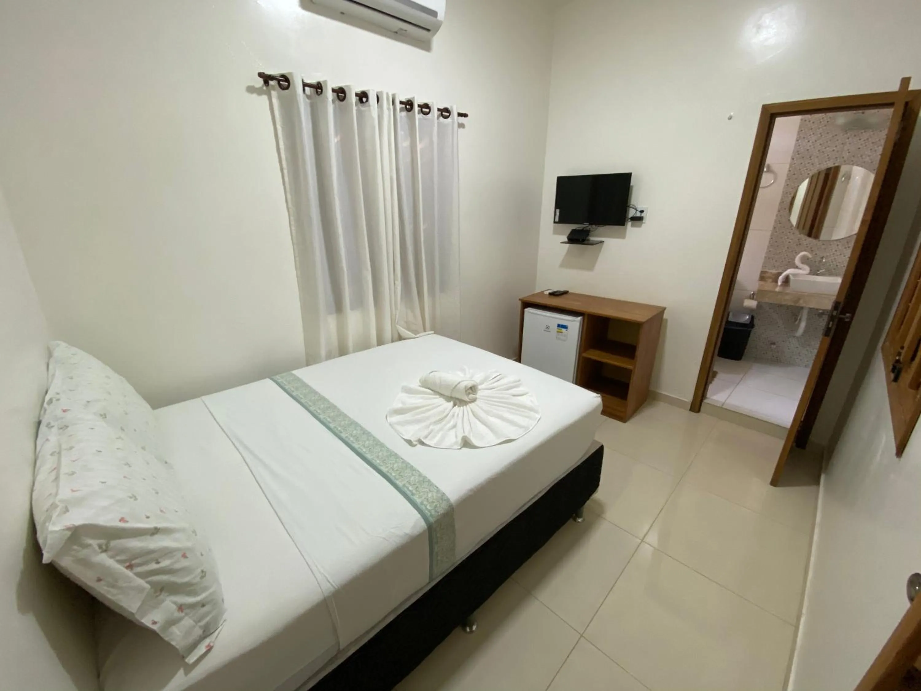 Bed in Pousada Casa da Cion