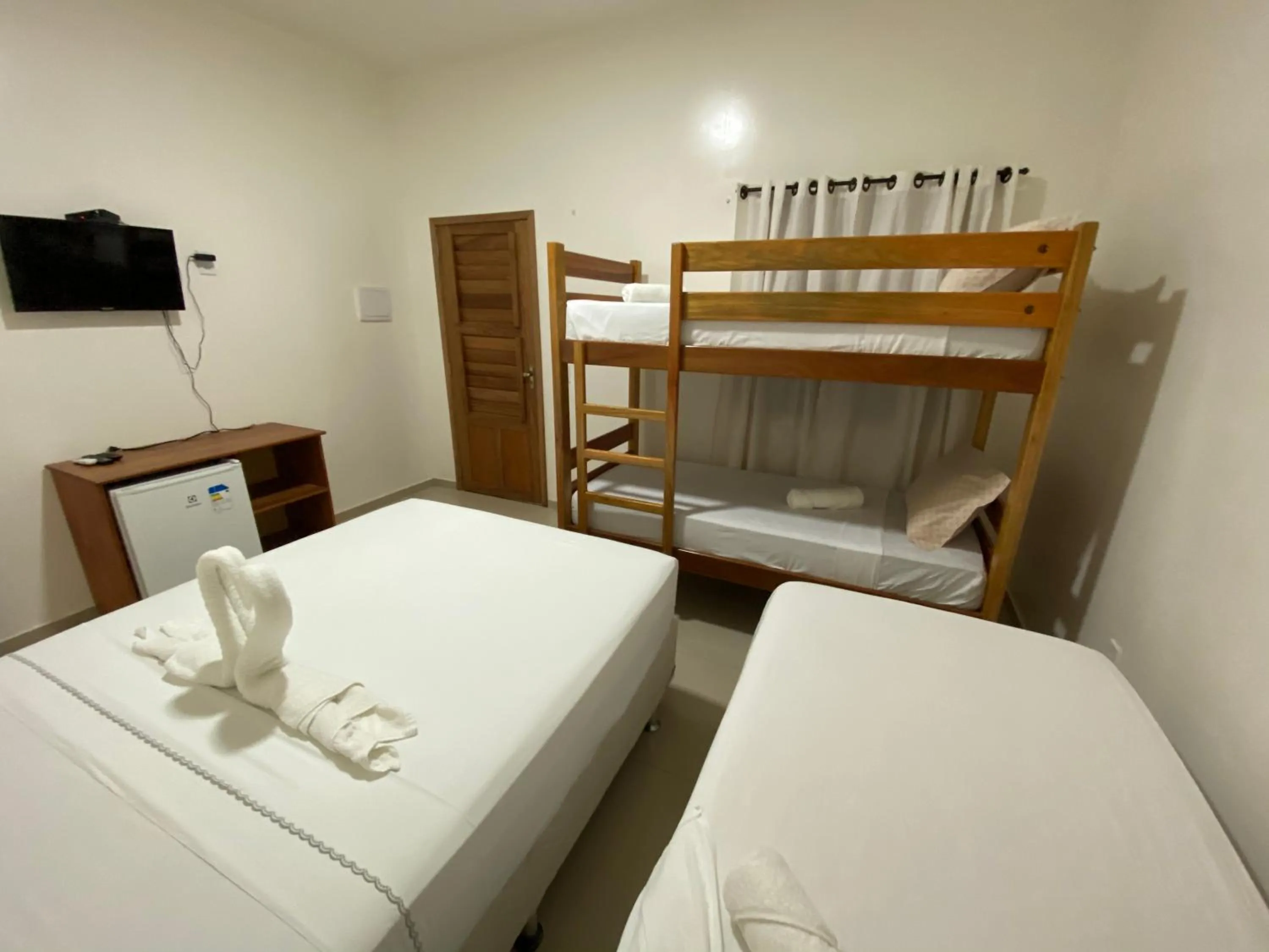 Bed in Pousada Casa da Cion