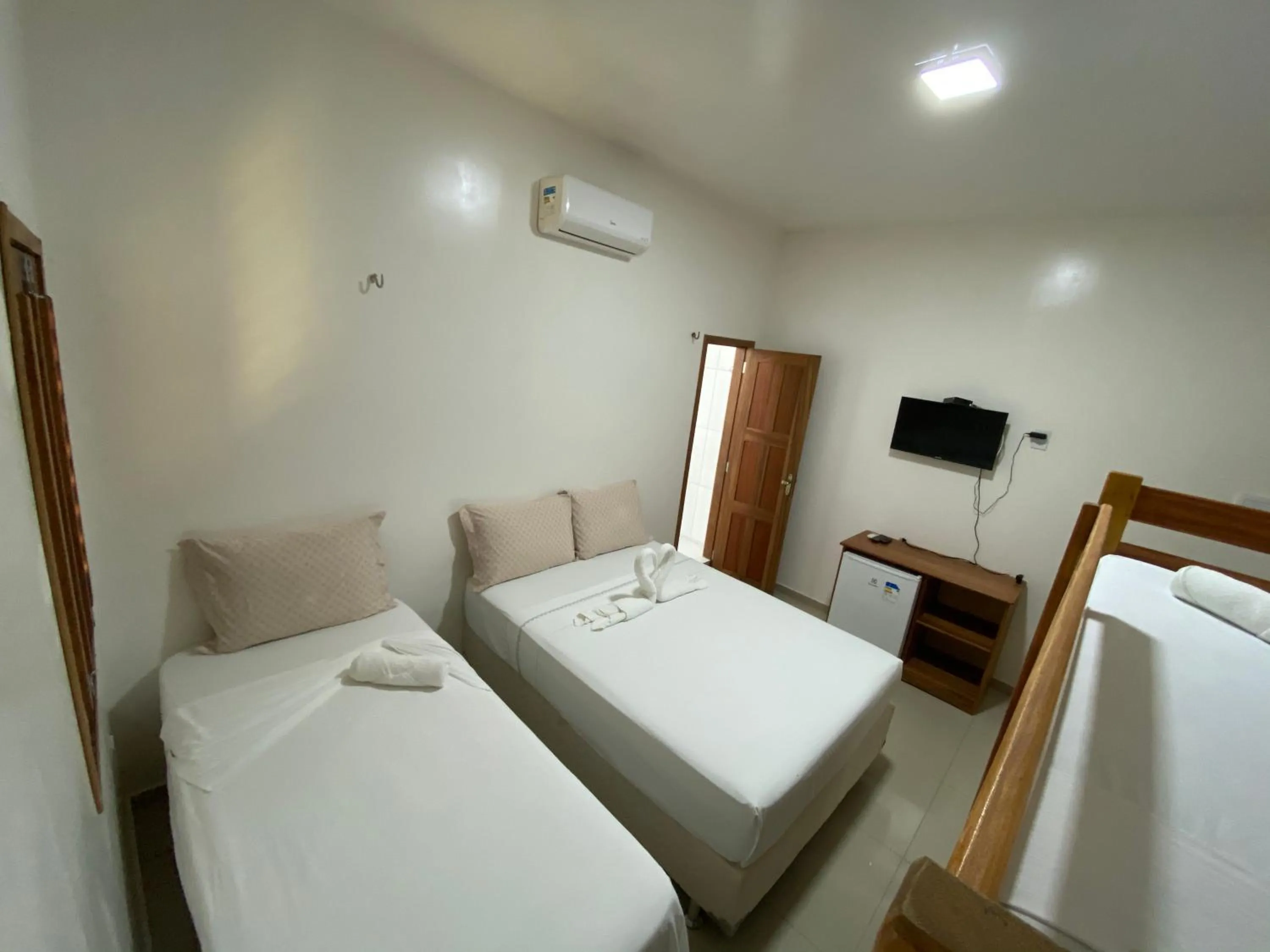 Bed in Pousada Casa da Cion