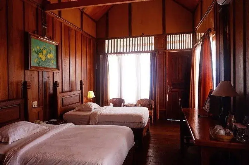 Bed in Wakatobi Patuno Diving and Beach Resort by SAHID Bed in Wakatobi Patuno Diving and Beach Resort by SAHID