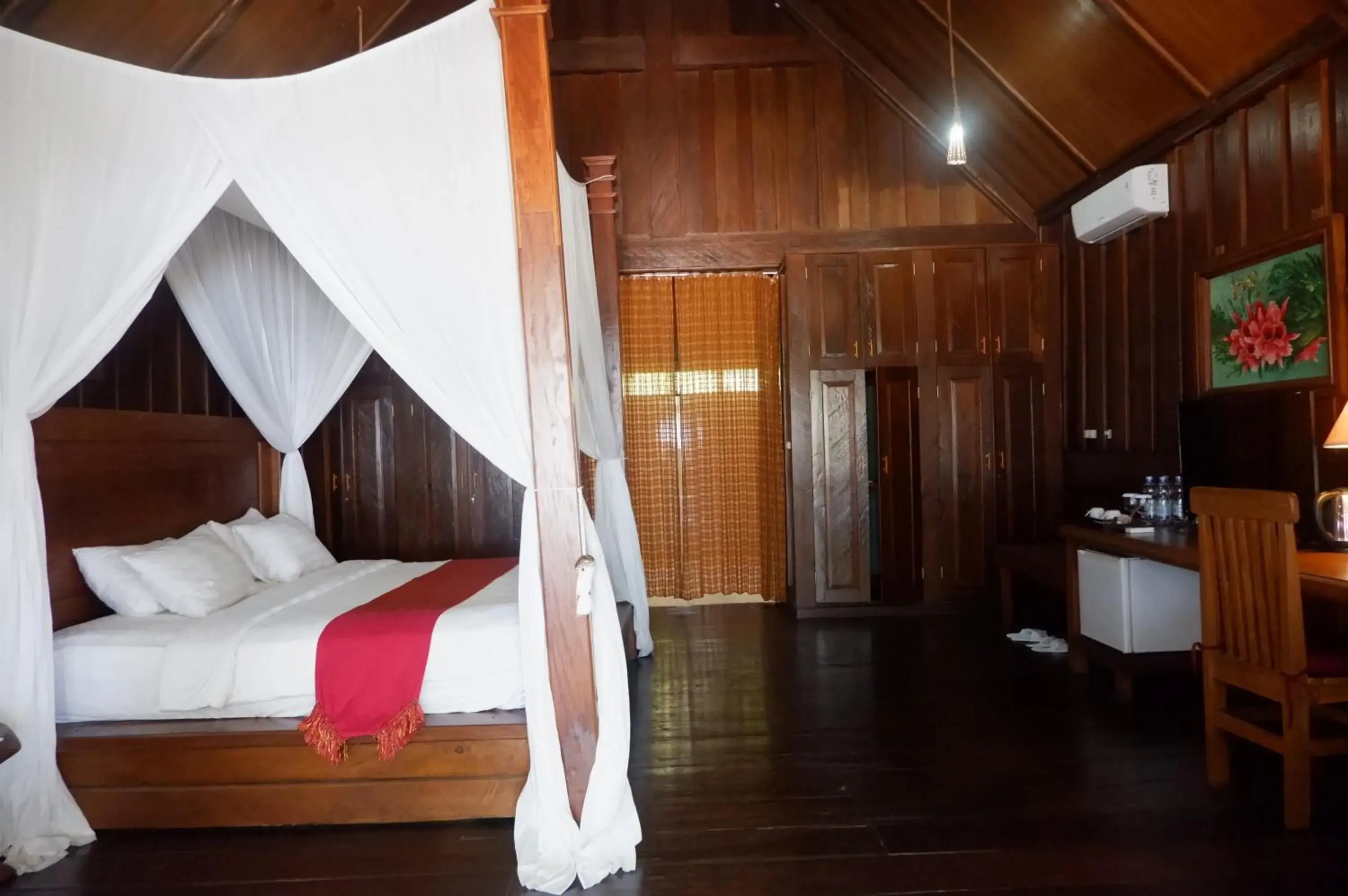 Bed in Wakatobi Patuno Diving and Beach Resort by SAHID Bed in Wakatobi Patuno Diving and Beach Resort by SAHID
