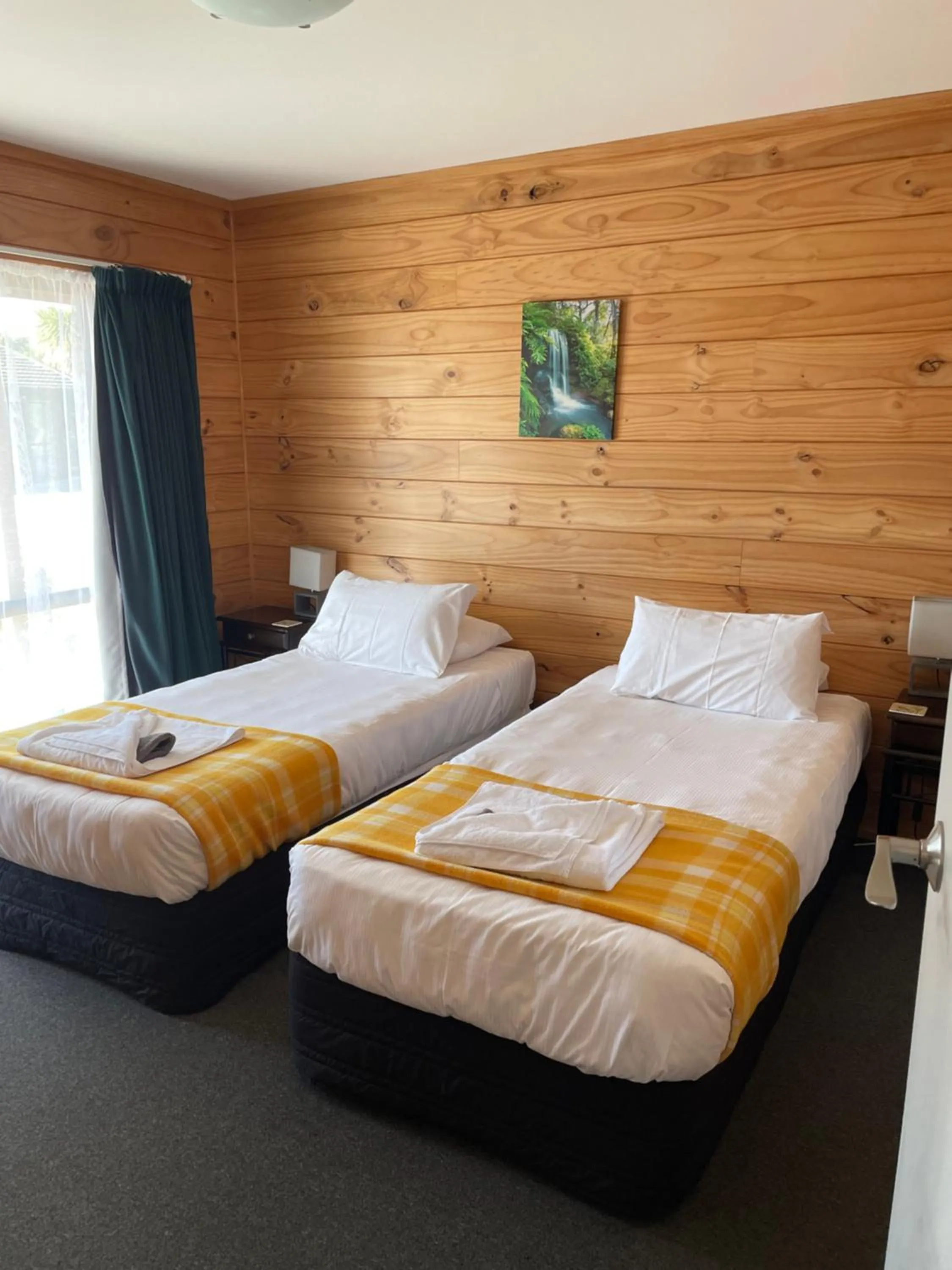 Bed in Buller Bridge Motel