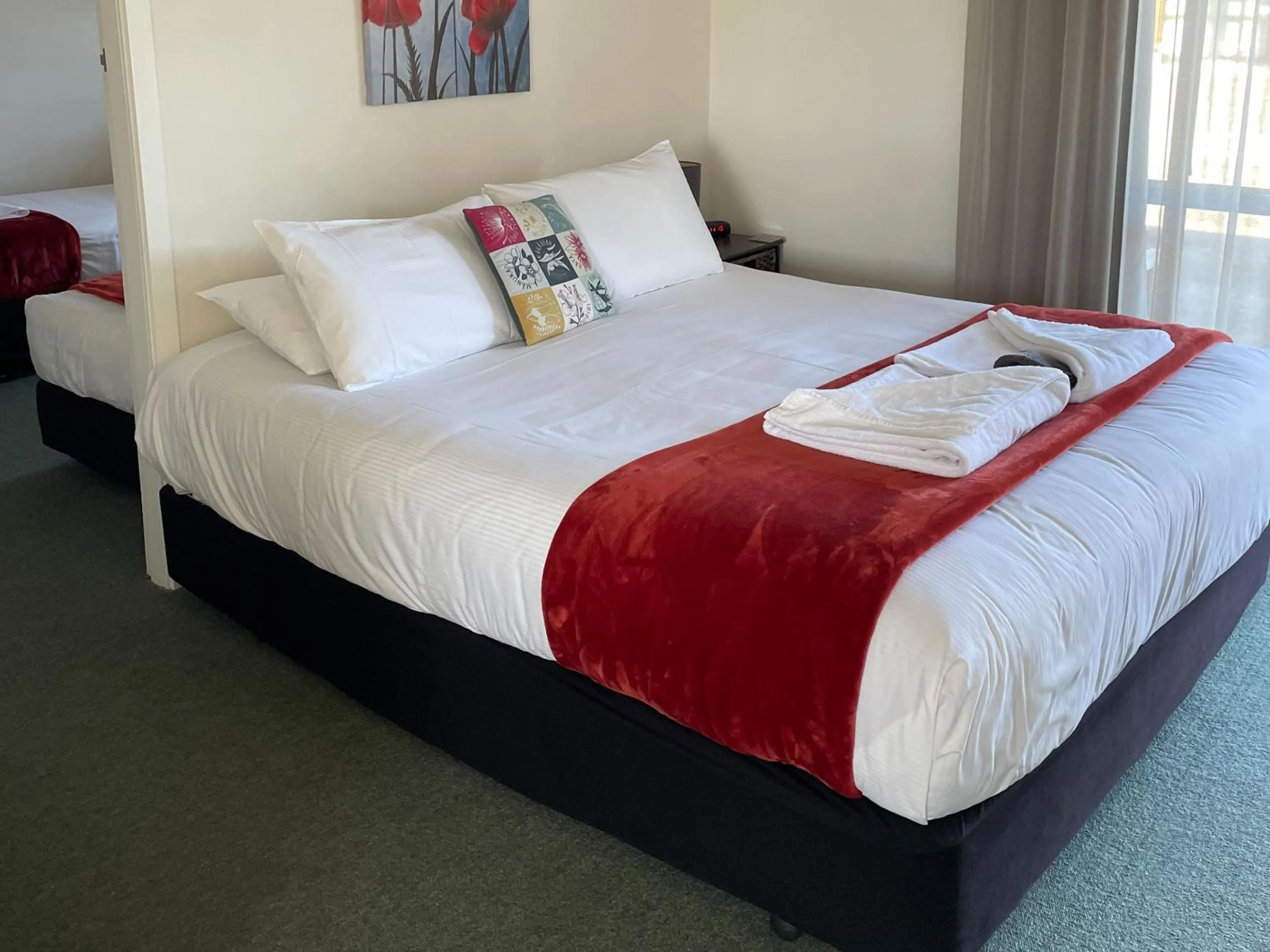 Bed in Buller Bridge Motel