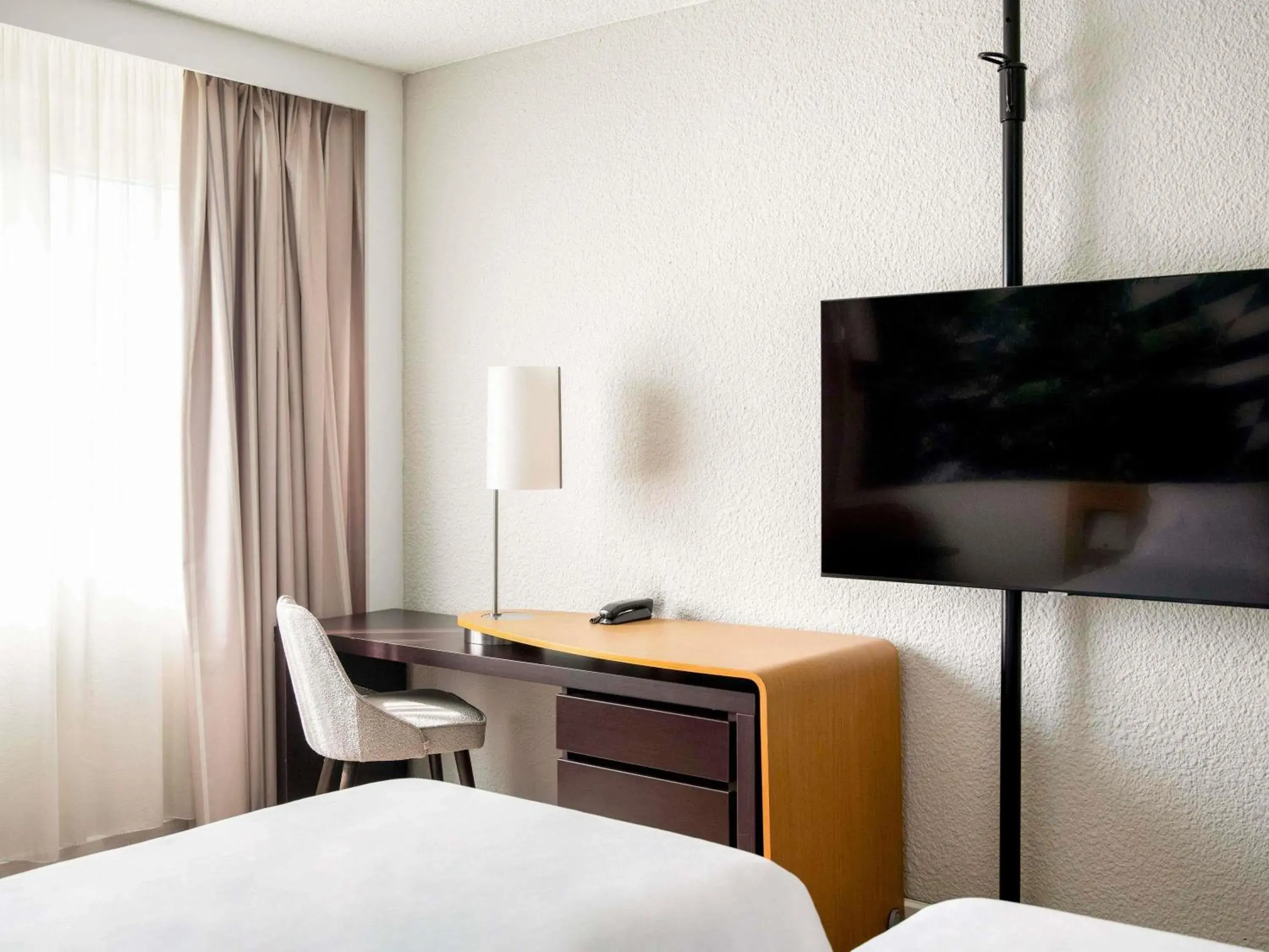 Triple Room with Garden View in Novotel Bordeaux Mérignac Triple Room with Garden View in Novotel Bordeaux Mérignac