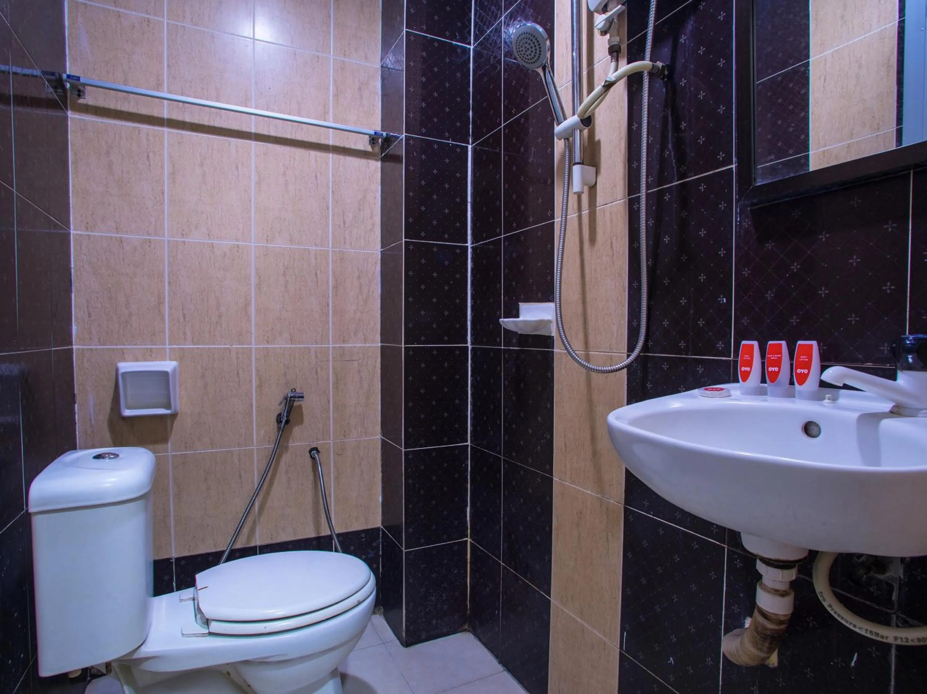 Bathroom in OYO 44010 Royals Star Hotel