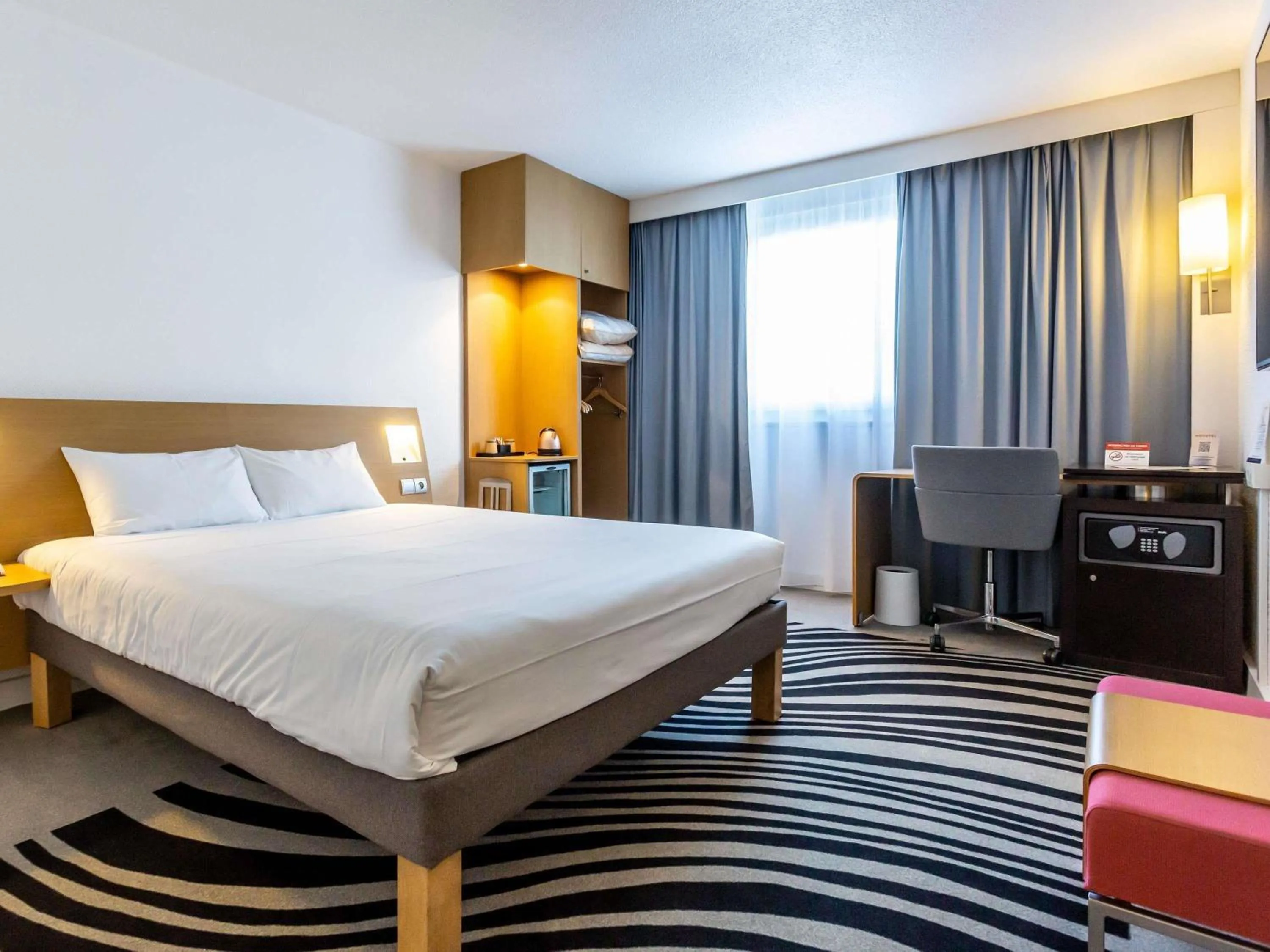 Property building, Bed in Novotel Bourges