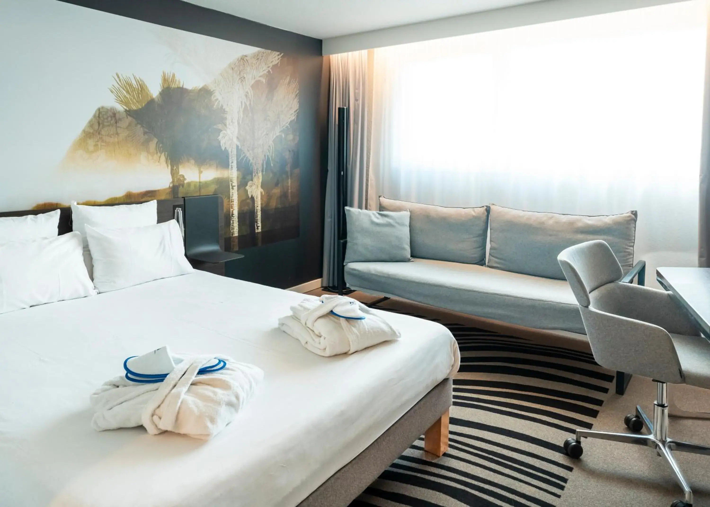 Bed in Novotel Caen Côte de Nacre Bed in Novotel Caen Côte de Nacre