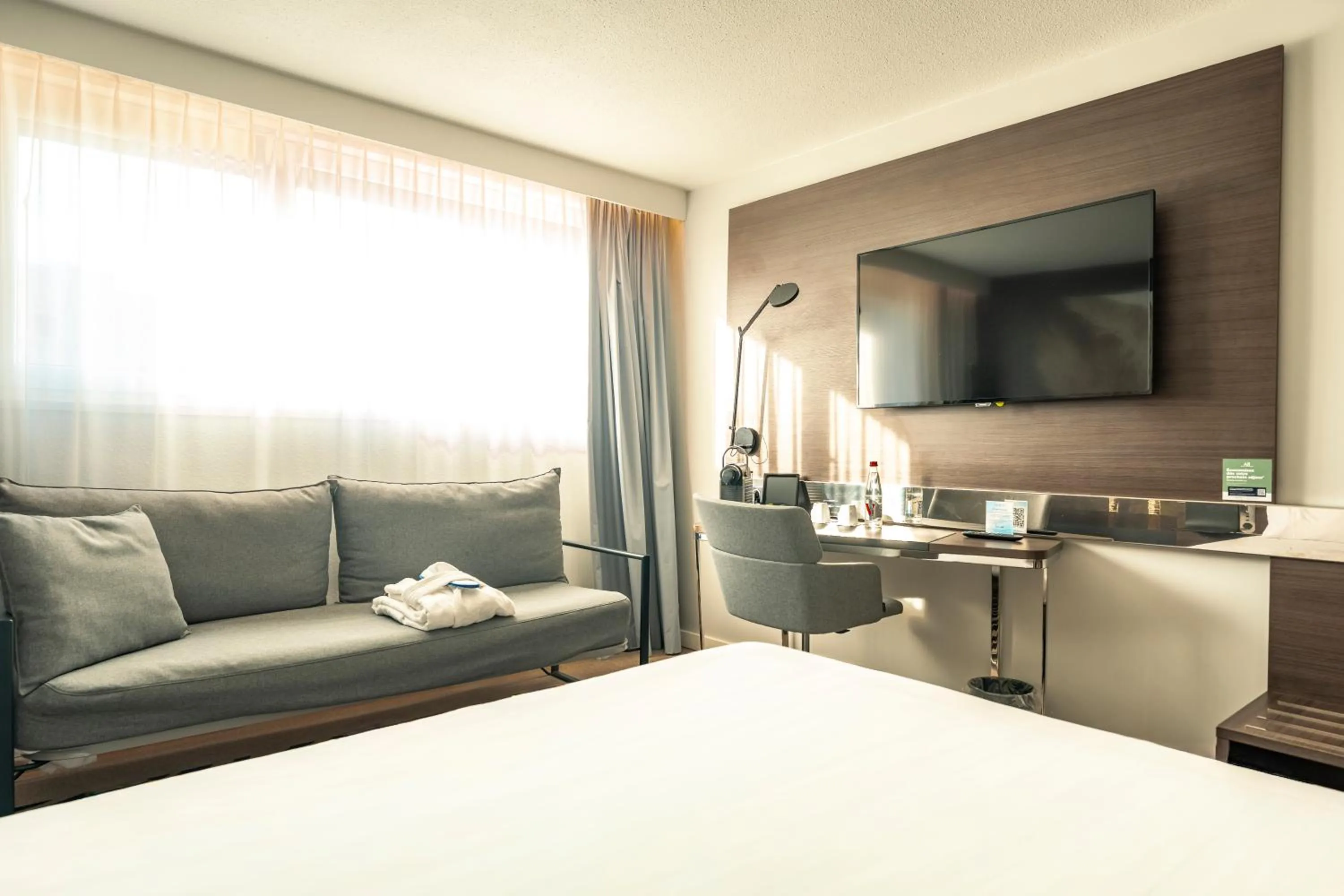 Bed in Novotel Caen Côte de Nacre