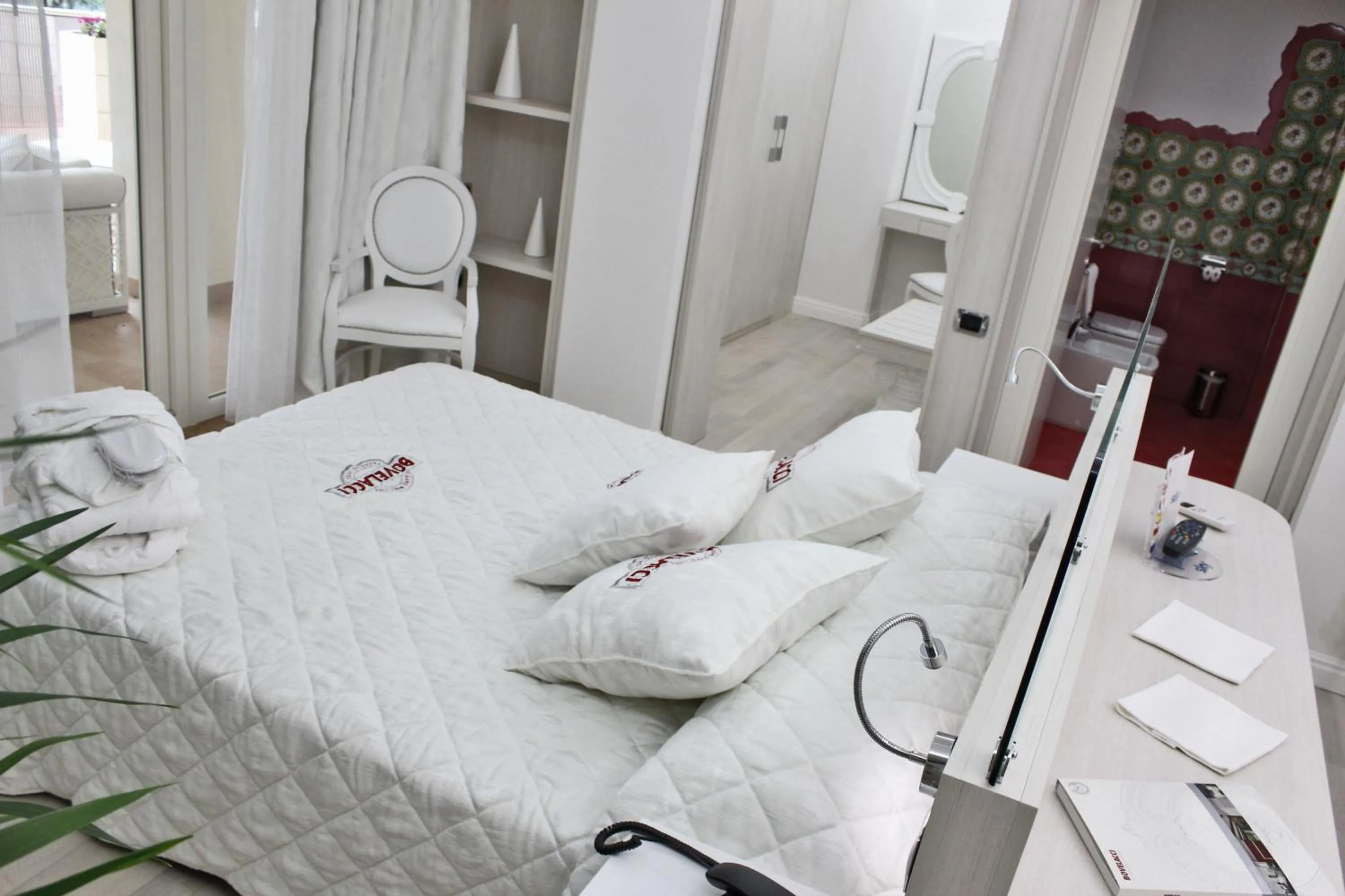 Toilet, Bed in Boutique Hotel Paradiso Bovelacci