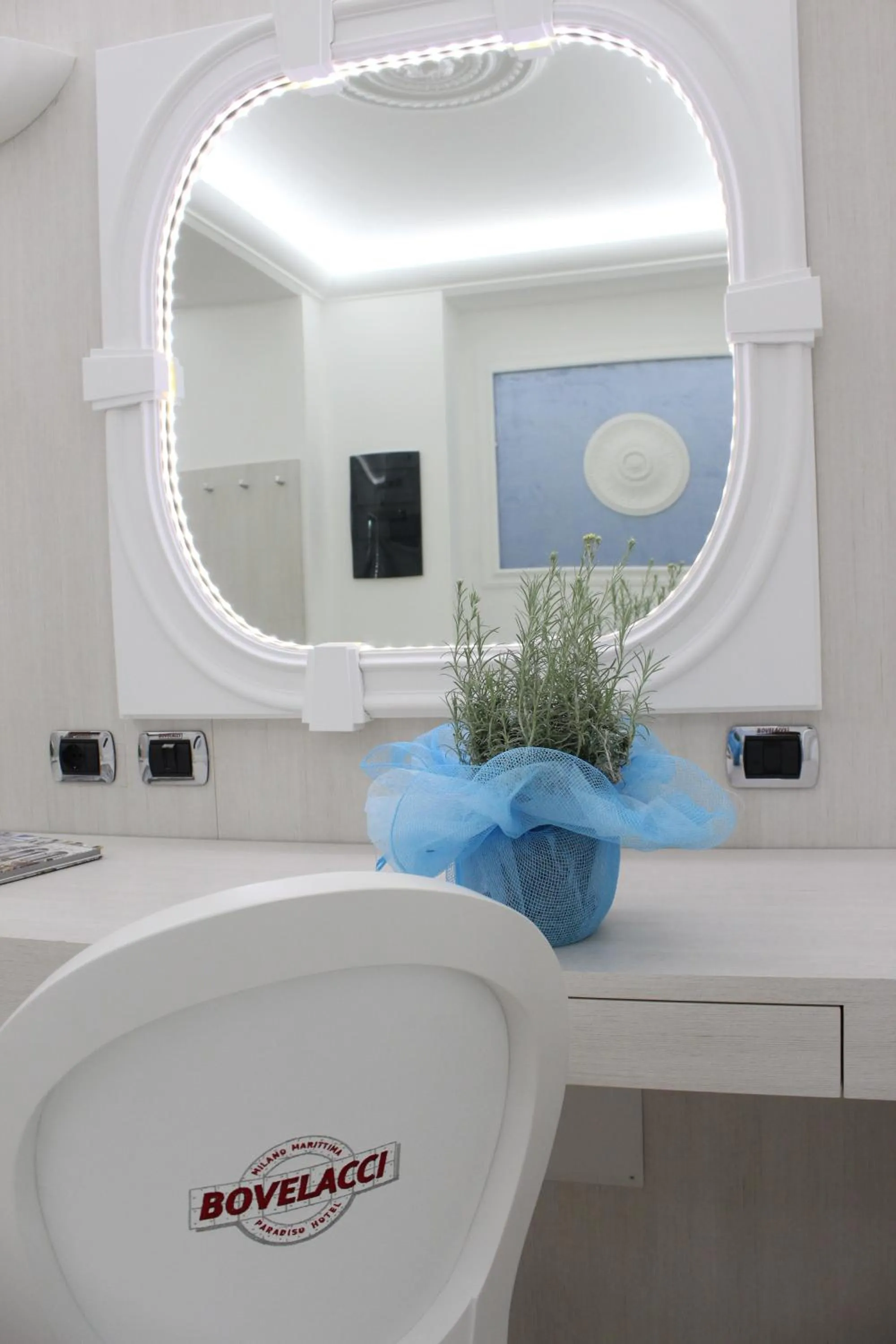 Property logo or sign in Boutique Hotel Paradiso Bovelacci