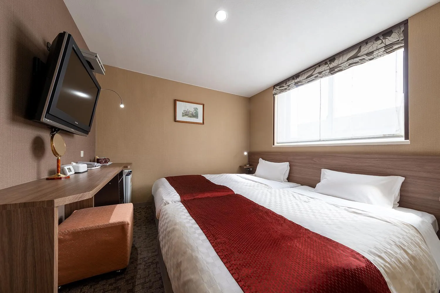 Photo of the whole room, Bed in Hiroshima Intelligent Hotel Stadium Mae