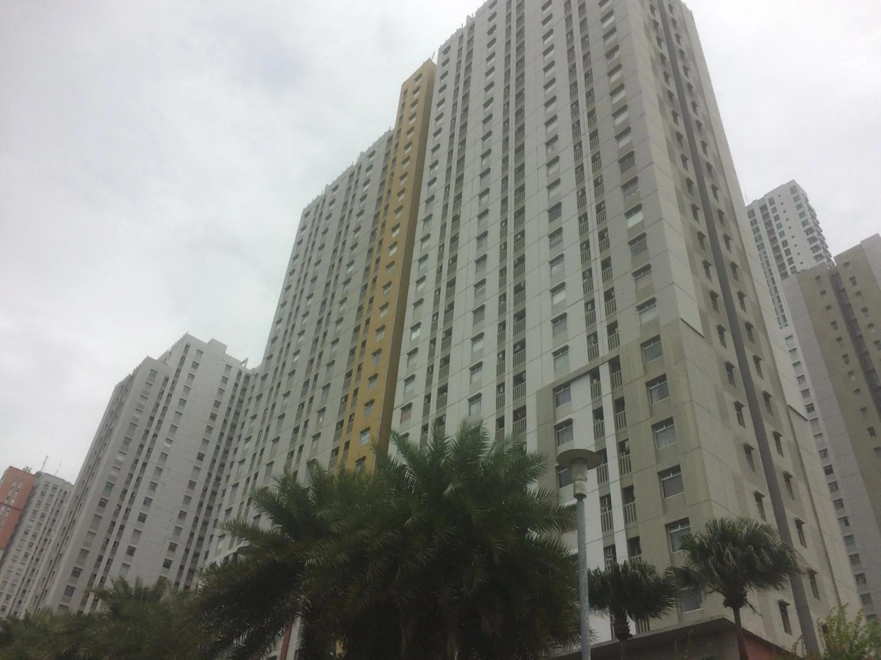 Property building in Green Bay Pluit Studio Apartment with 2 Single Beds By Travelio