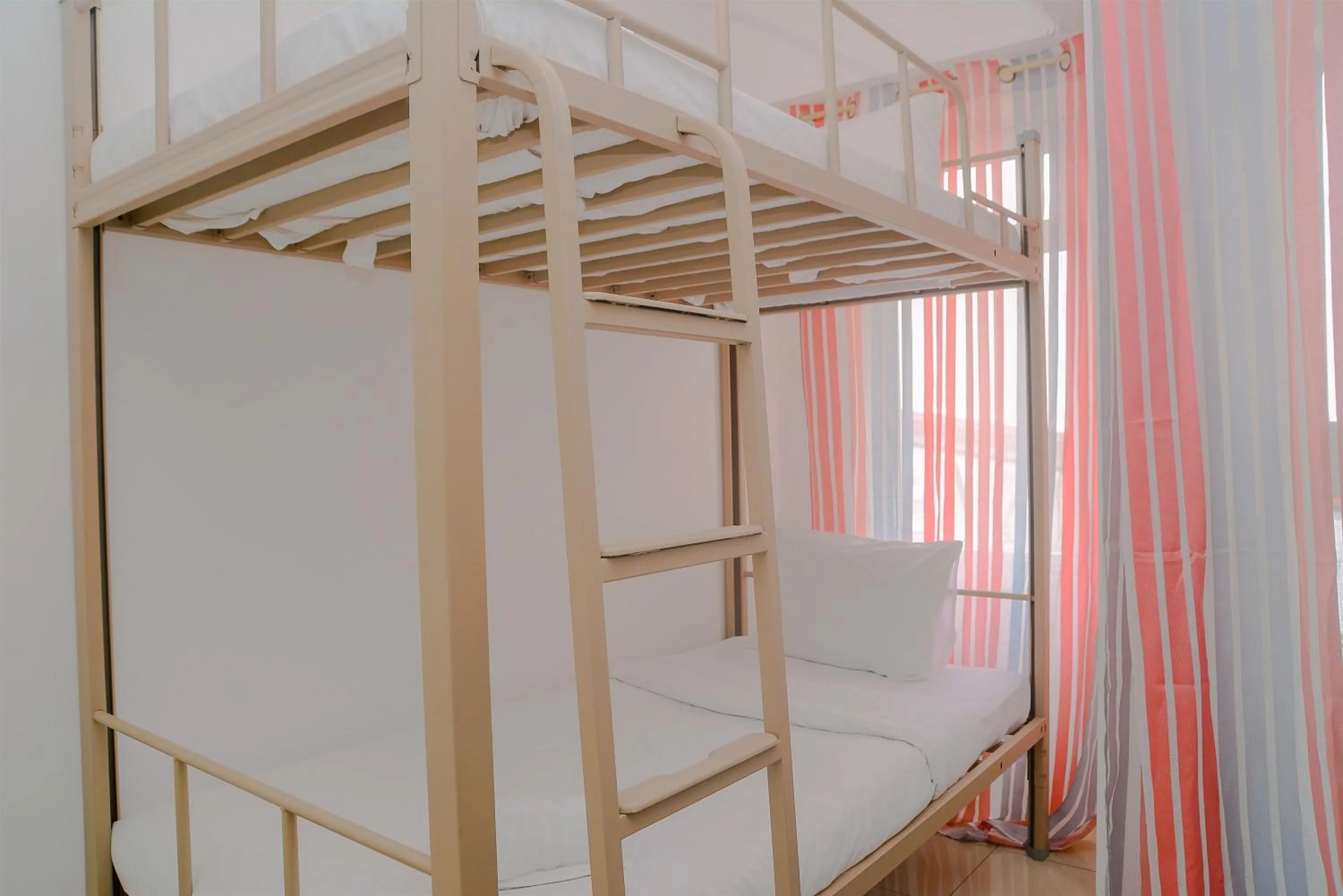 Bed in Green Bay Pluit Studio Apartment with 2 Single Beds By Travelio