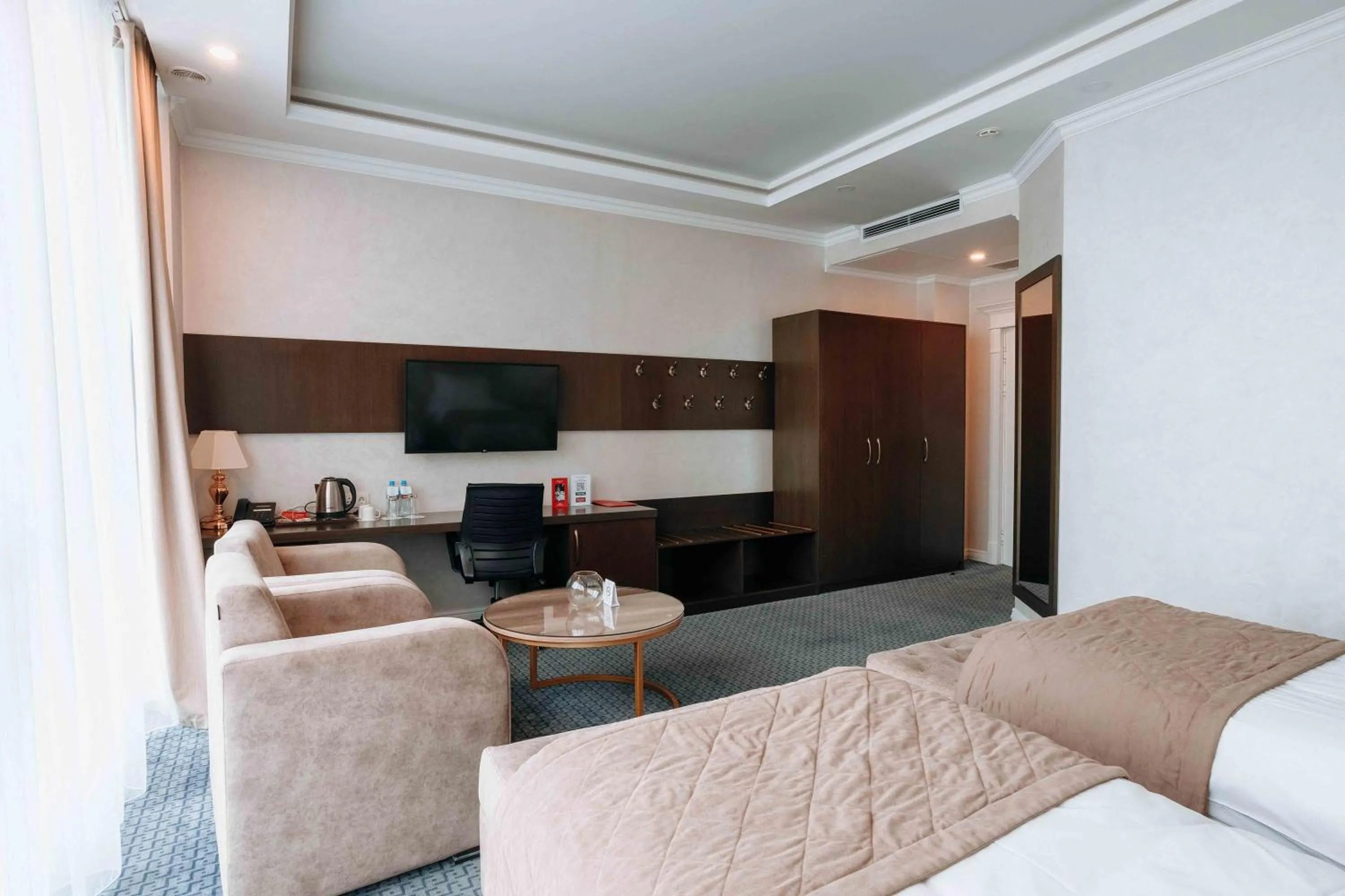 TV and multimedia, Bed in Ramada by Wyndham Shymkent