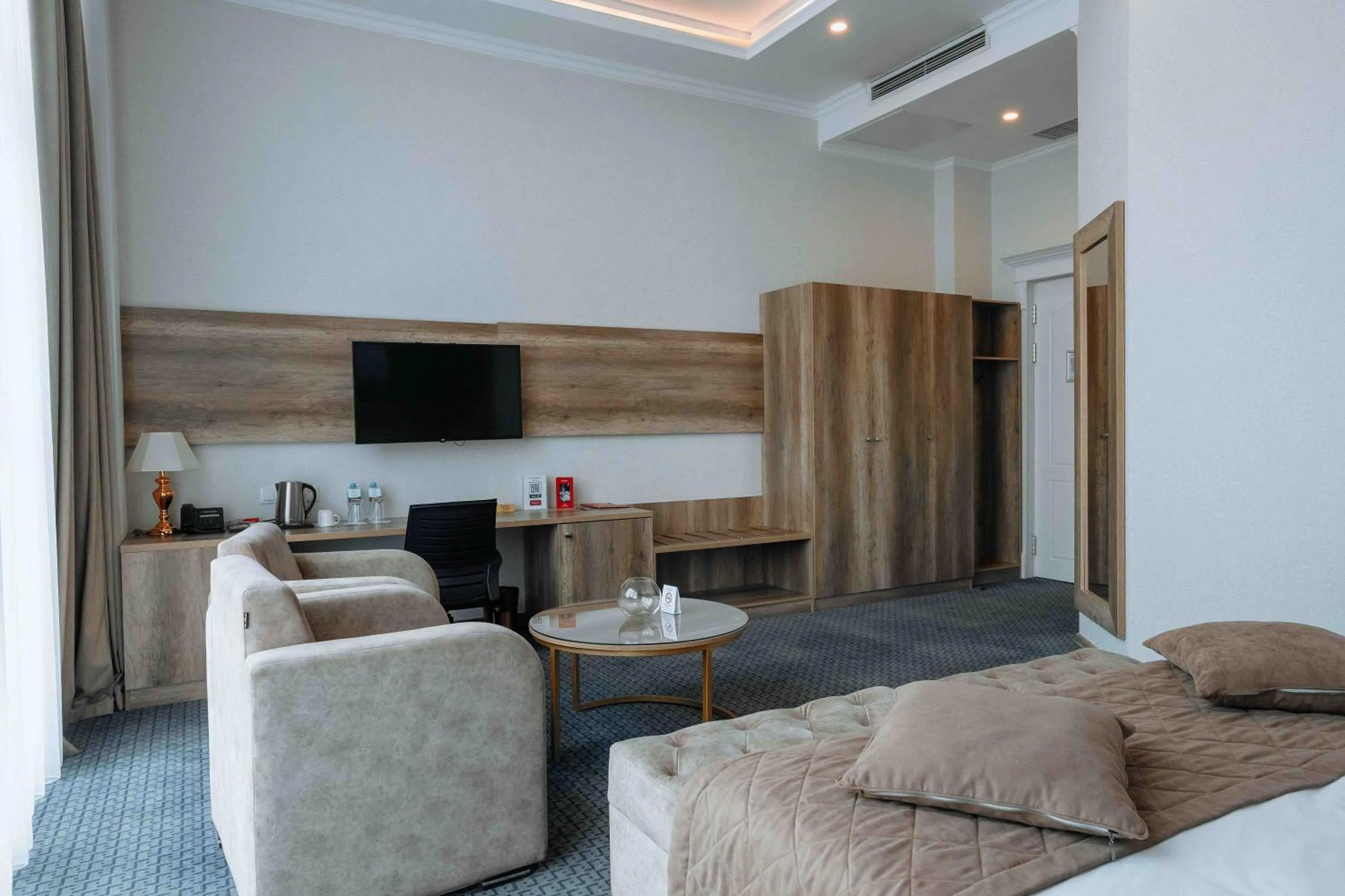 Bed in Ramada by Wyndham Shymkent