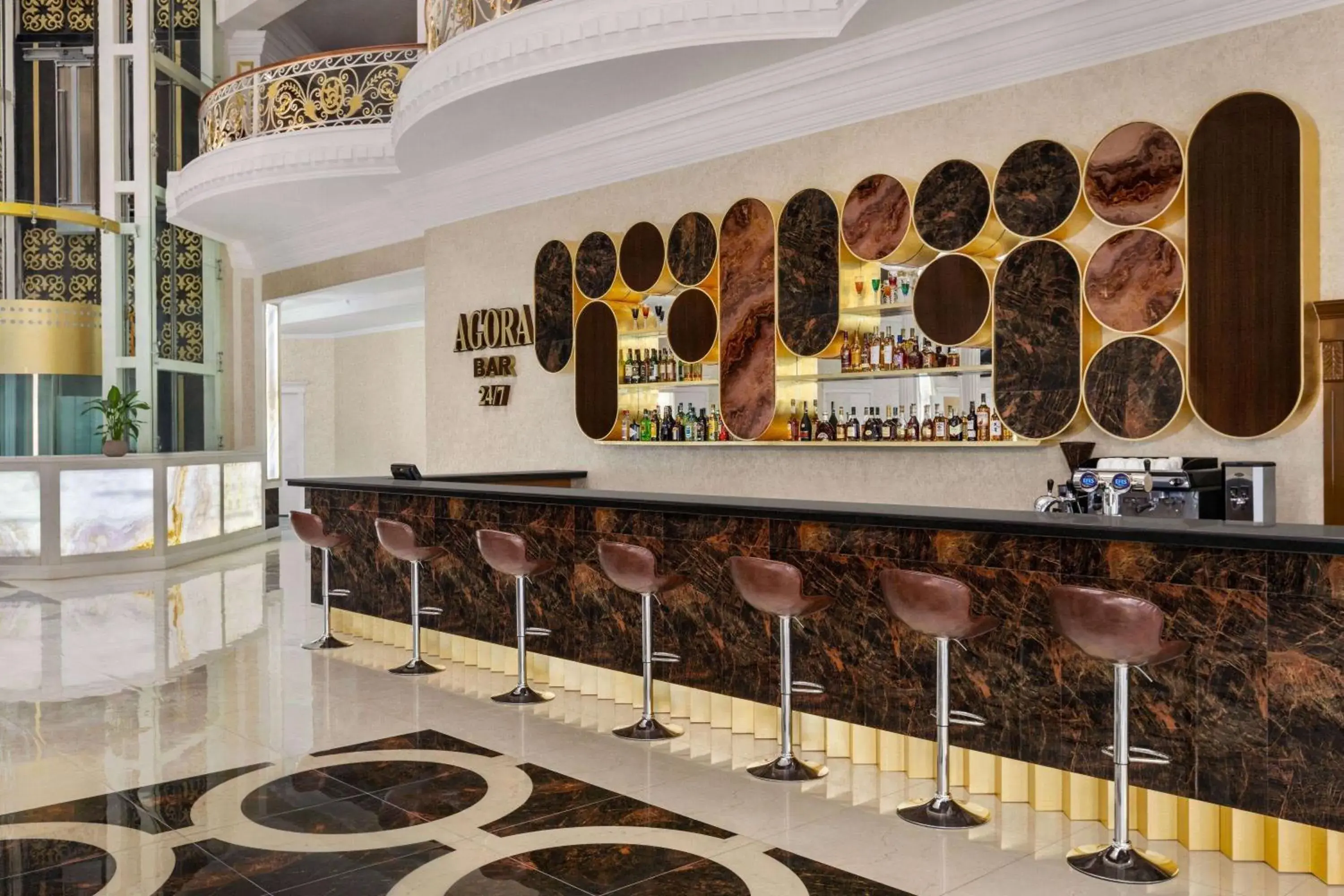 Lounge or bar in Ramada by Wyndham Shymkent Lounge or bar in Ramada by Wyndham Shymkent
