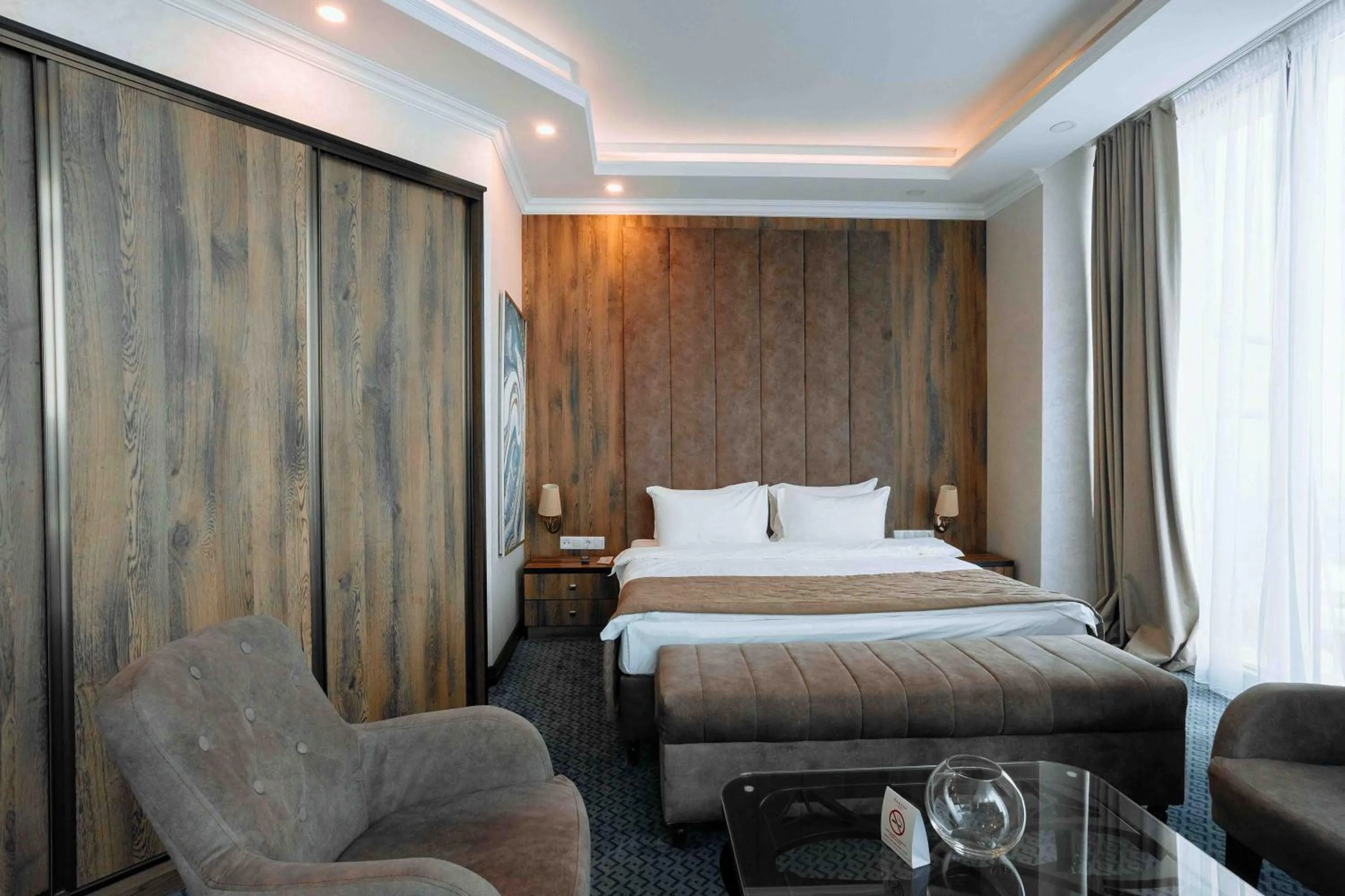 Bed in Ramada by Wyndham Shymkent