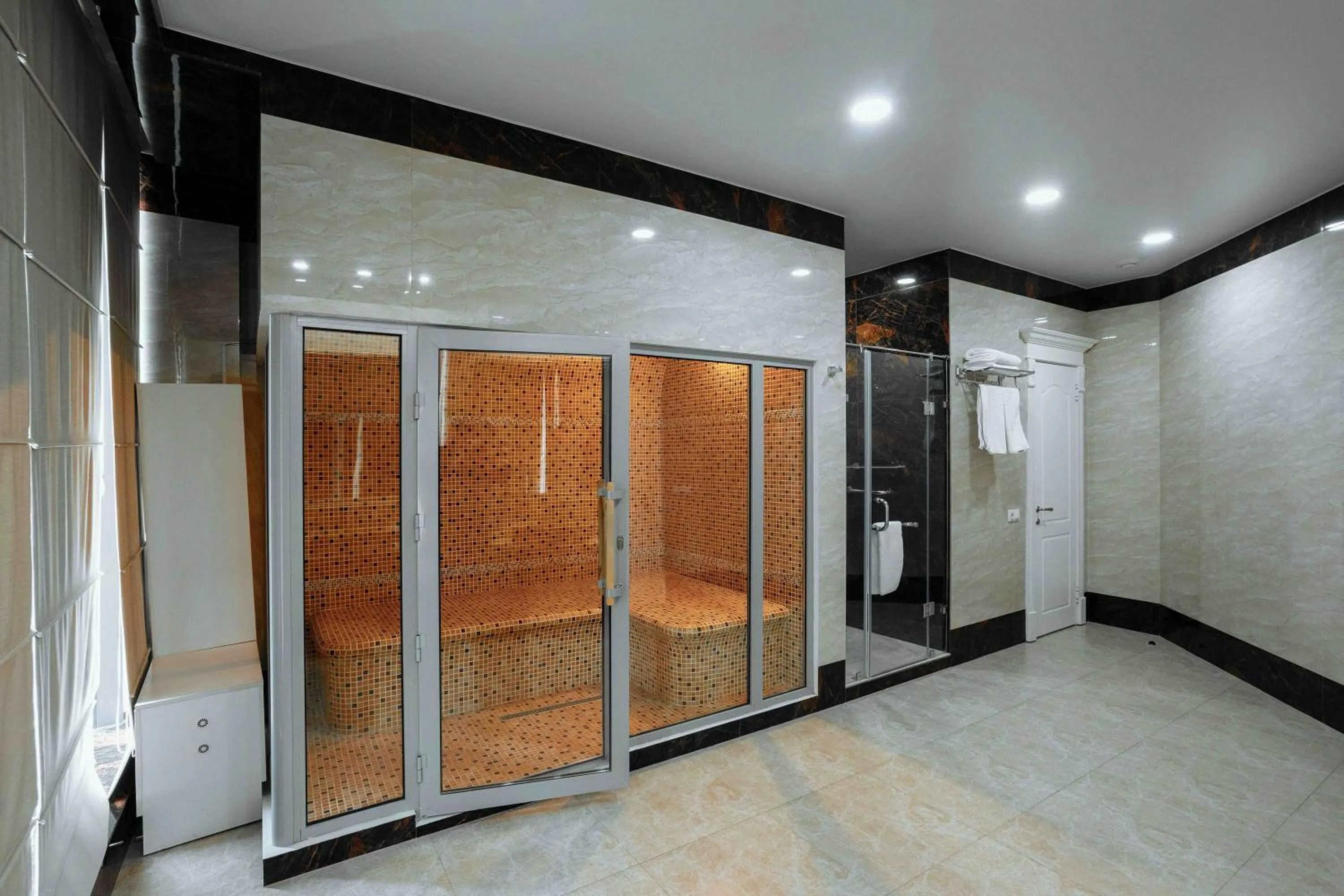 Shower in Ramada by Wyndham Shymkent