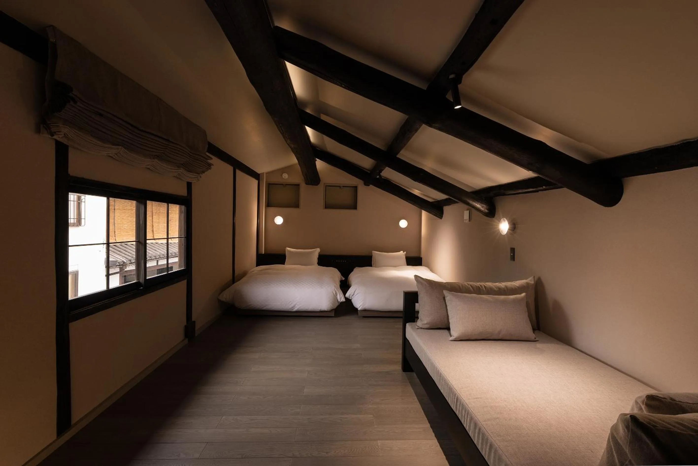 Bed in Tomonoura Shiomachi Hotel