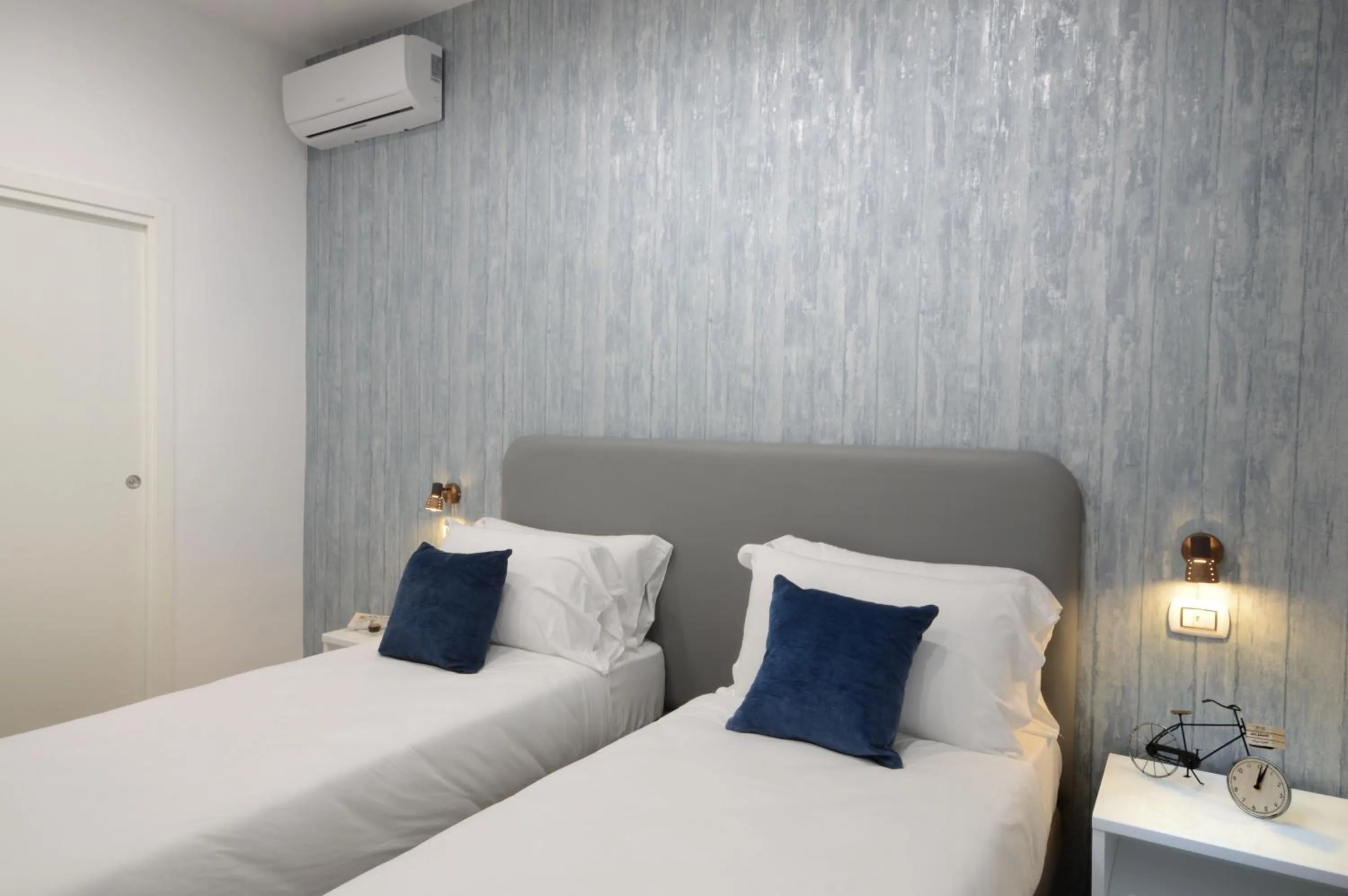 Bed in Napoliseason Rooms & Breakfast