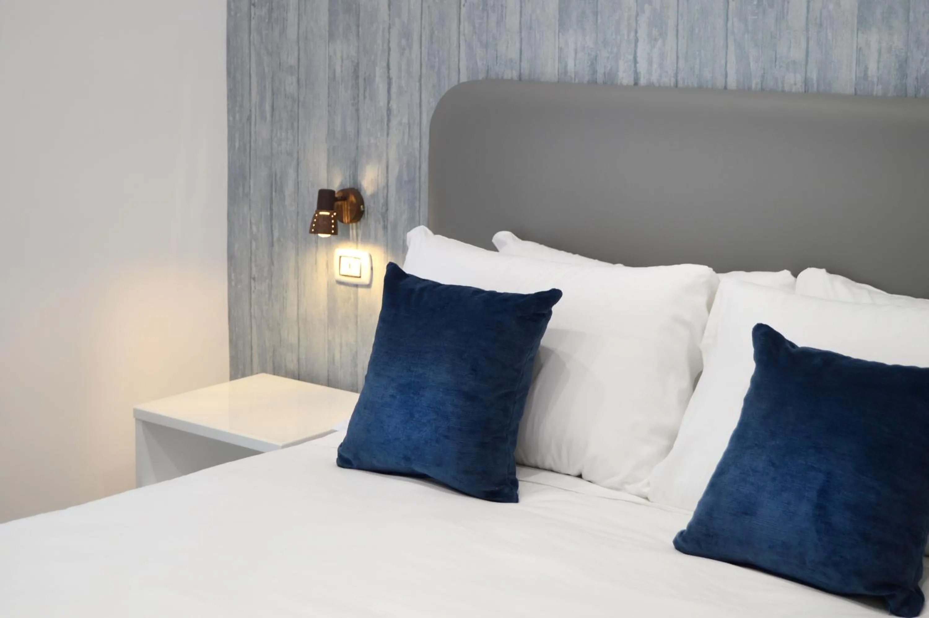 Bed in Napoliseason Rooms & Breakfast