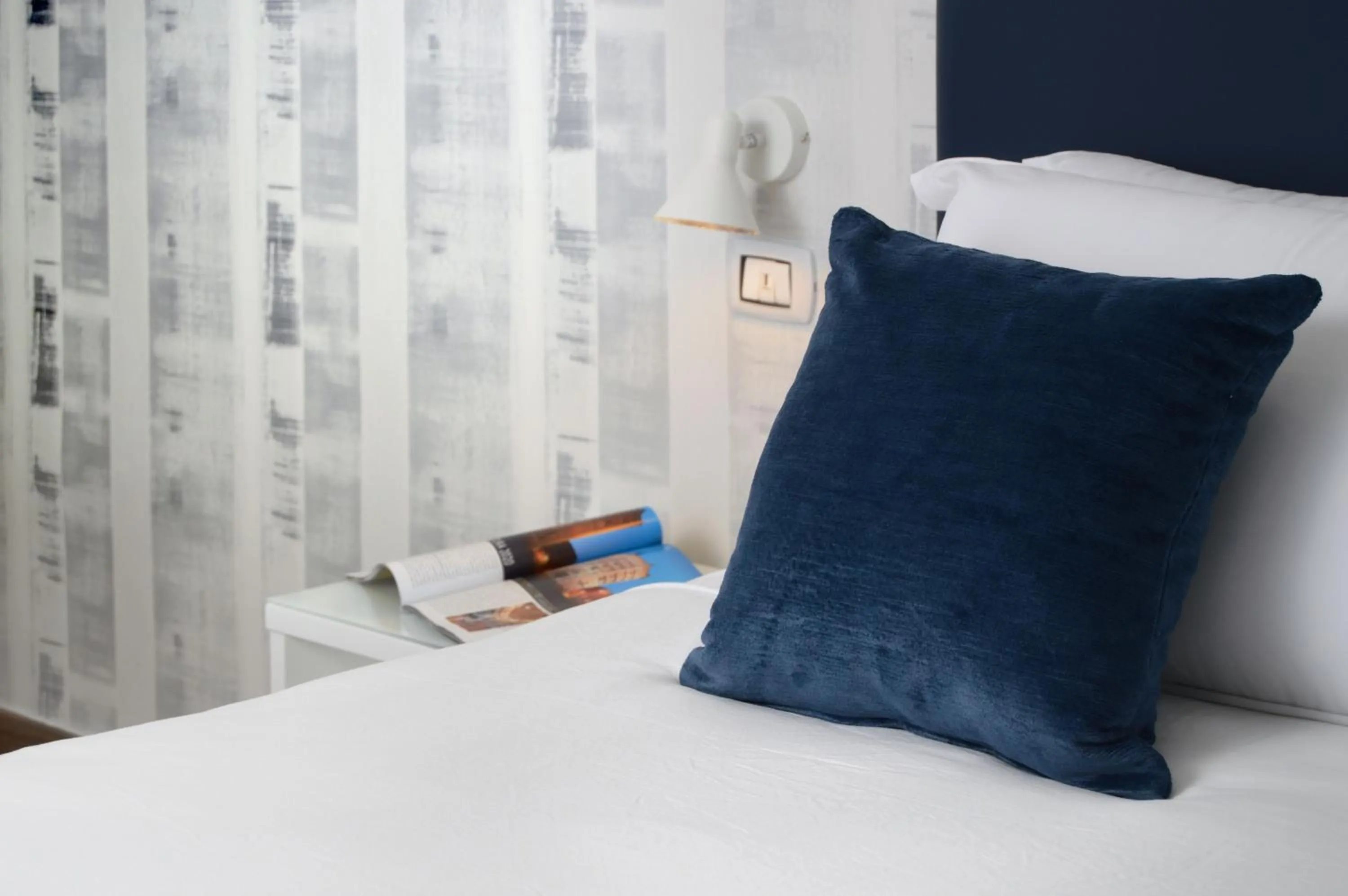 Bed in Napoliseason Rooms & Breakfast