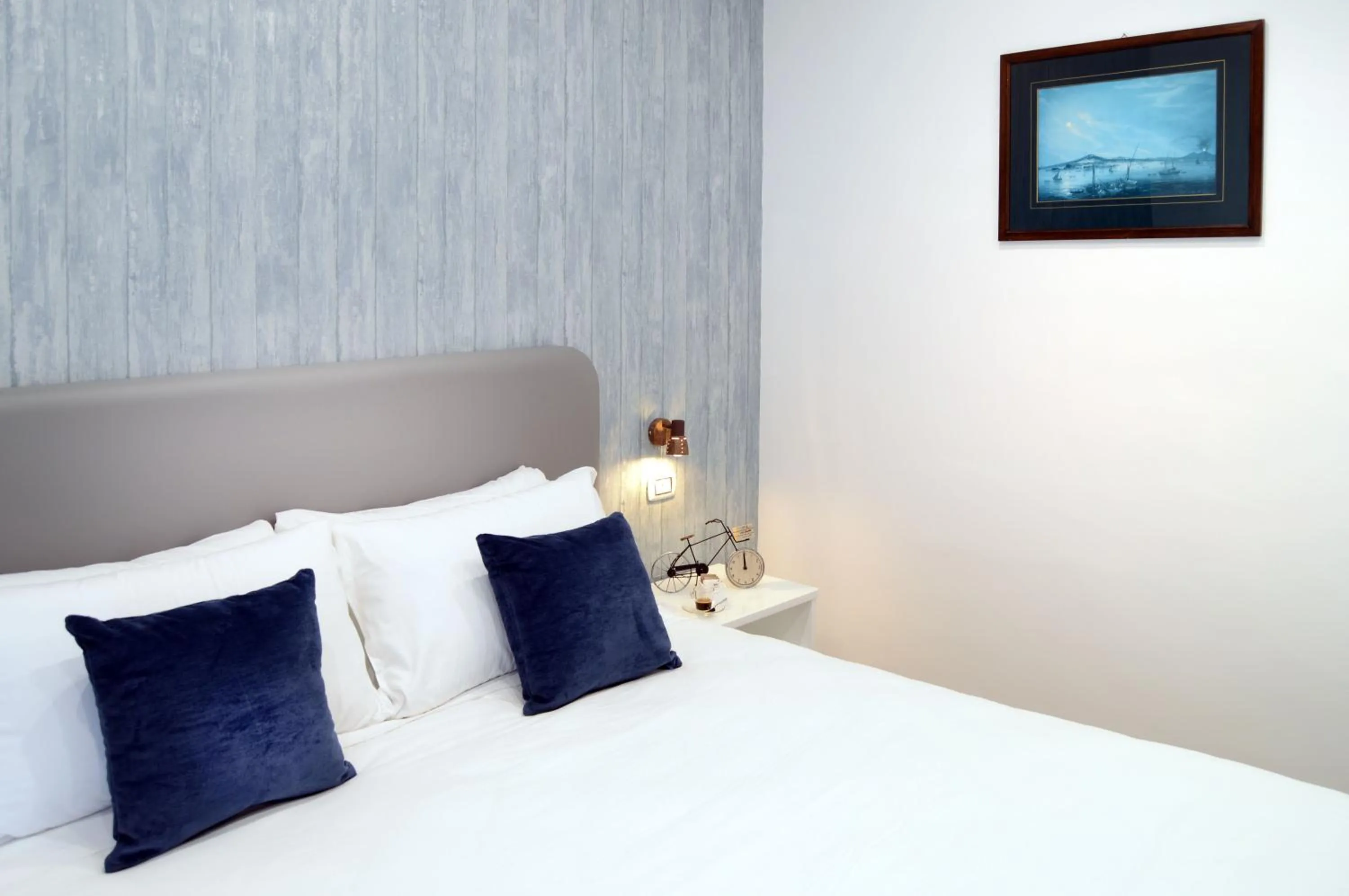 Bed in Napoliseason Rooms & Breakfast