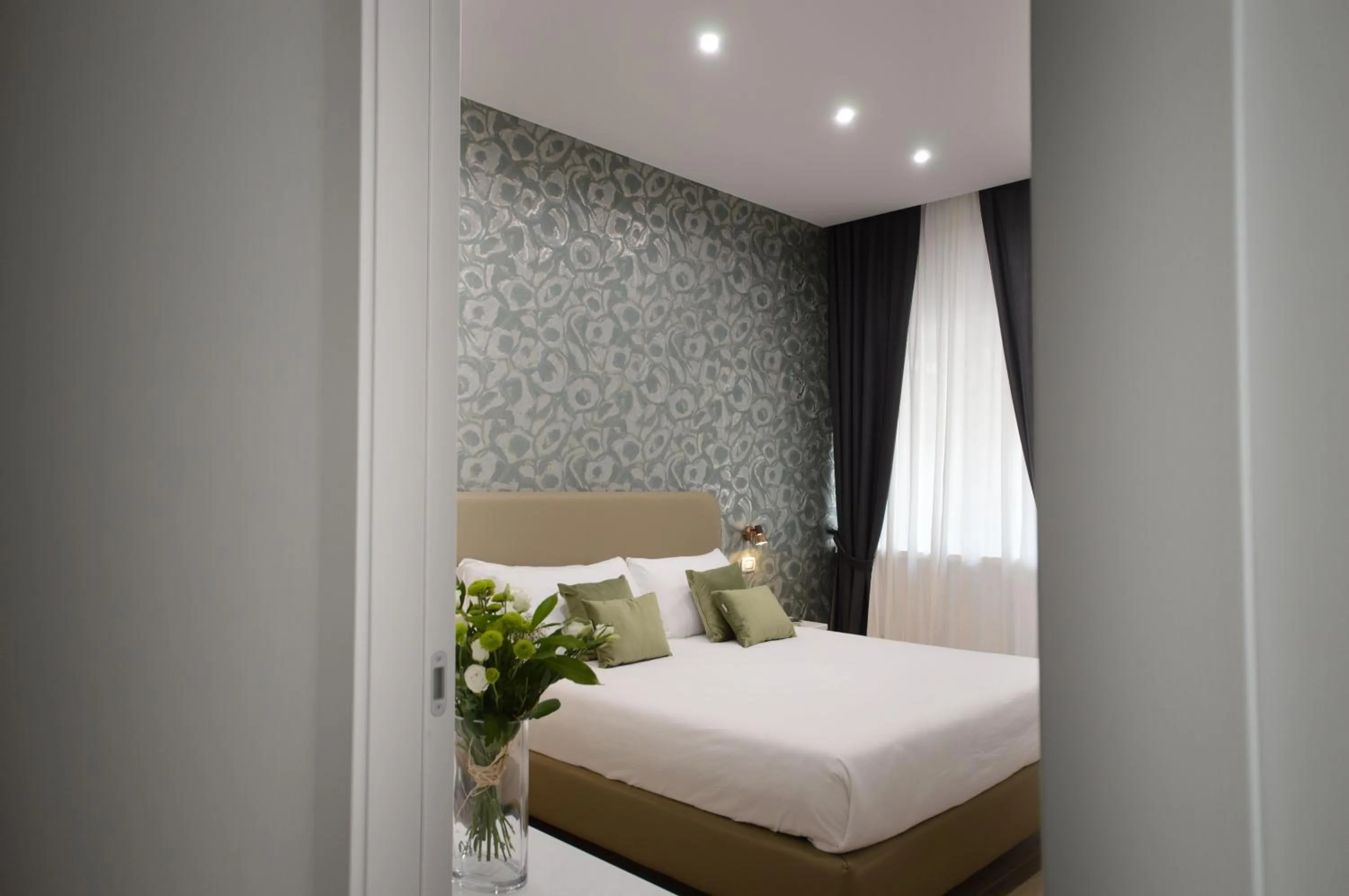 Bed in Napoliseason Rooms & Breakfast