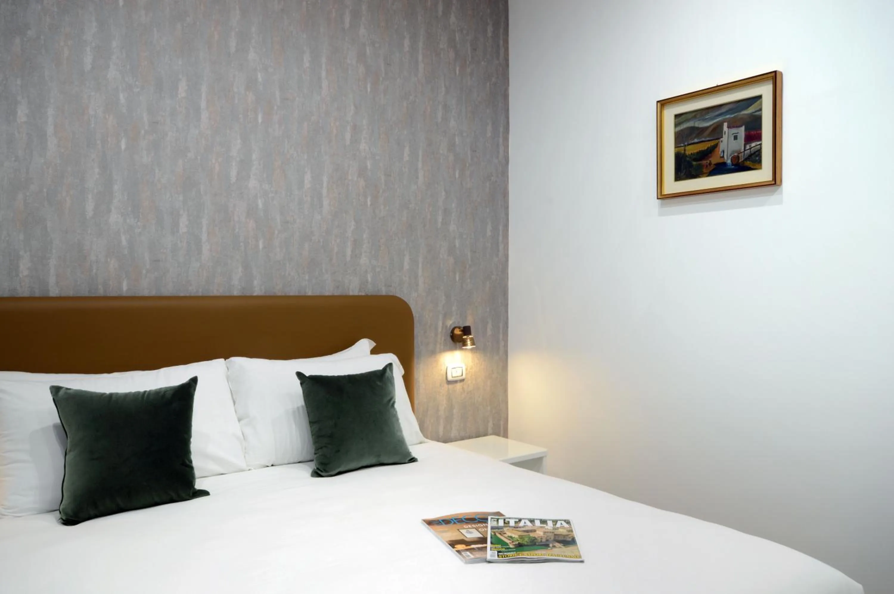 Bed in Napoliseason Rooms & Breakfast