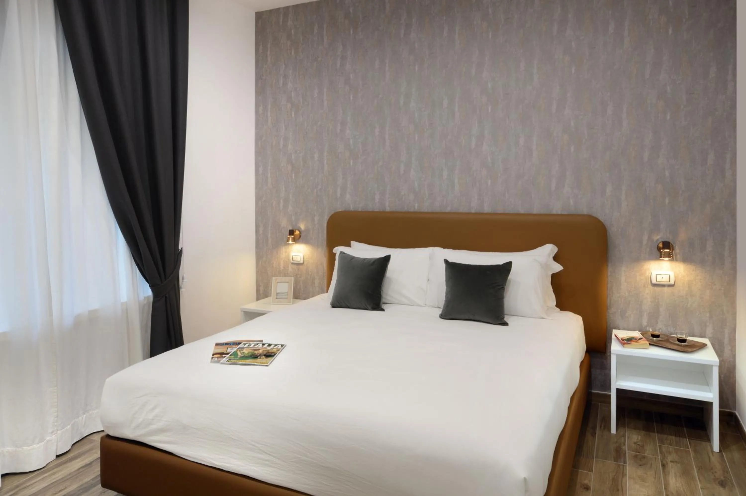 Bed in Napoliseason Rooms & Breakfast