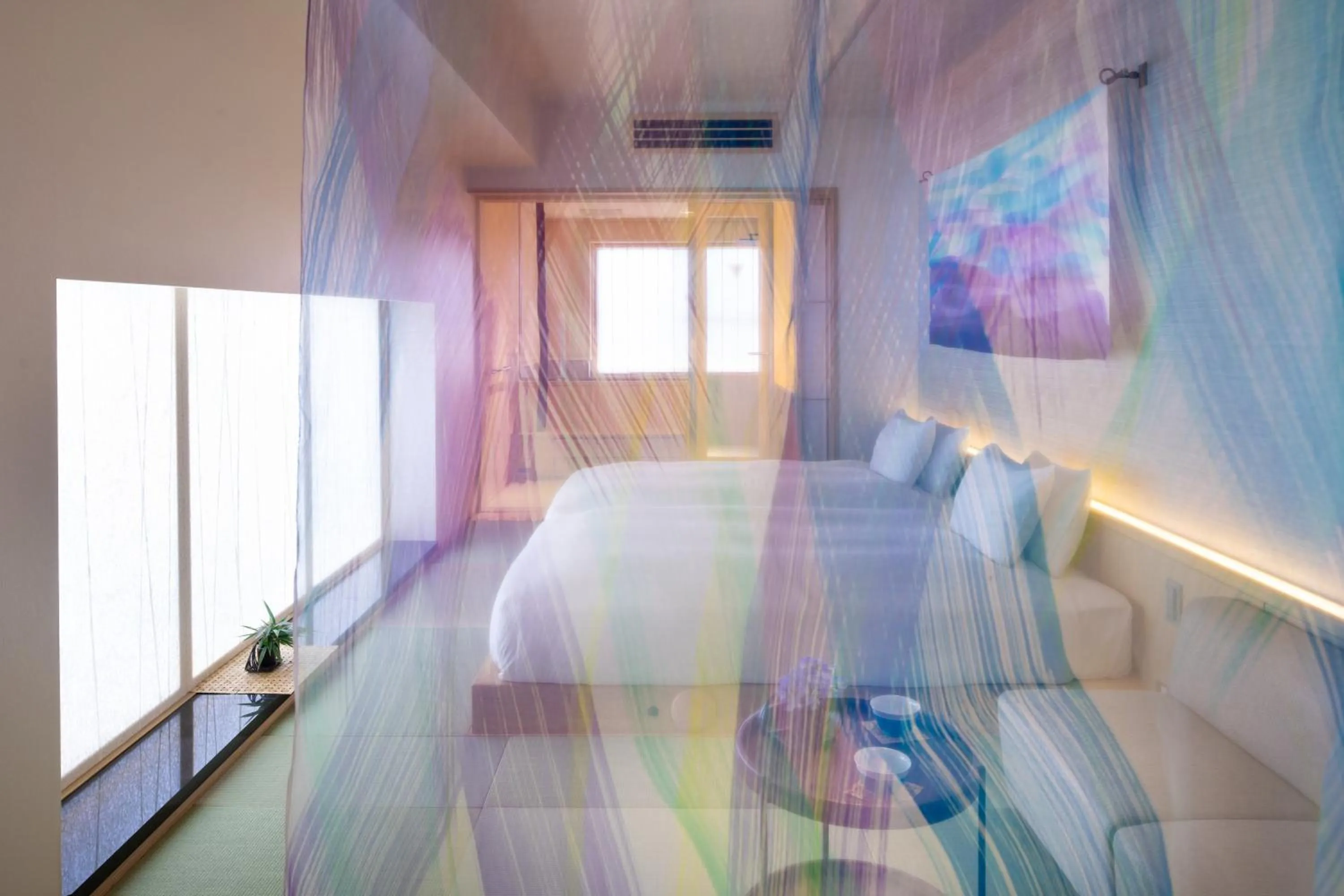 Bed in THE JUNEI HOTEL Kyoto