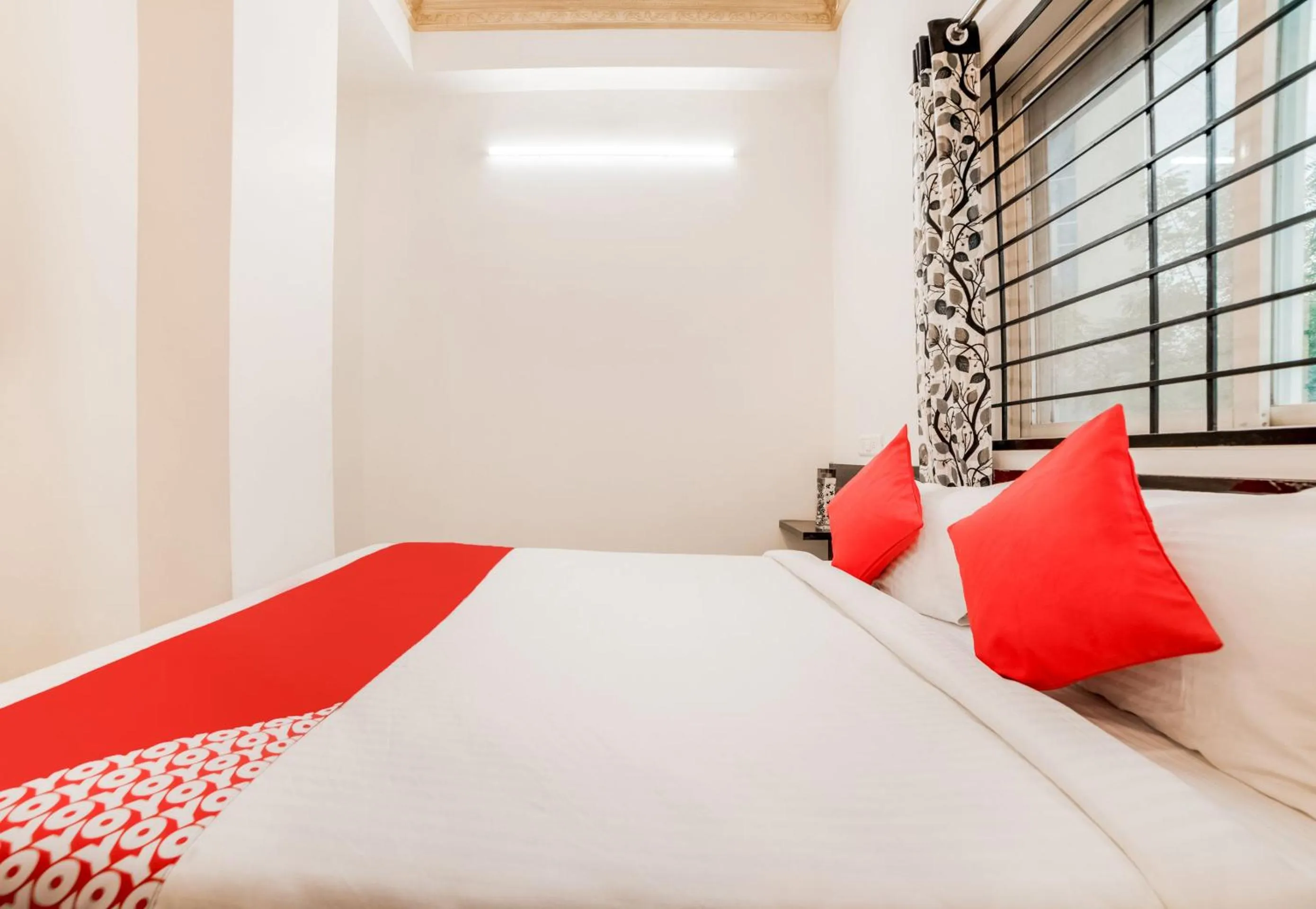 Bedroom, Bed in Super Hotel O Lucky Hotels Gachibowli