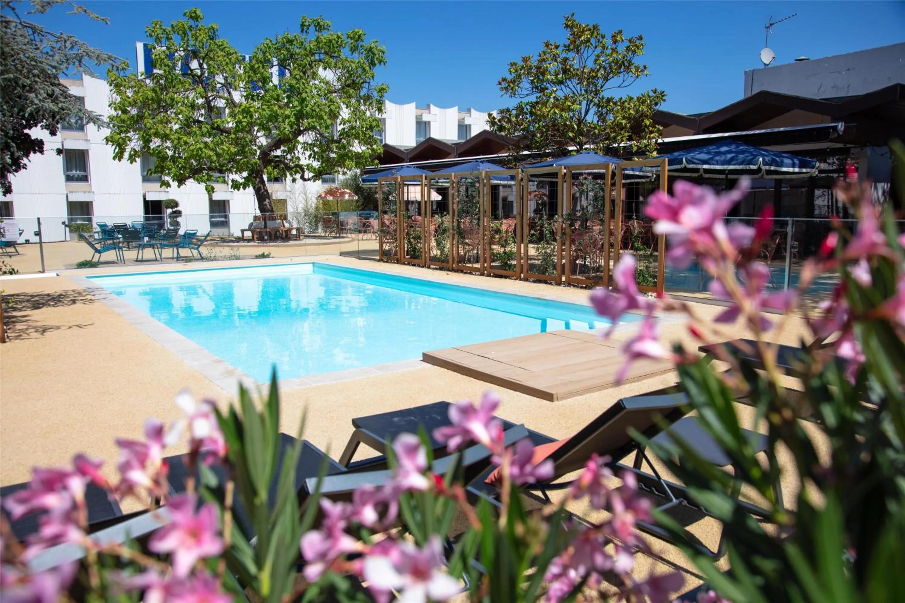 Pool view in Best Western Porte du Forez